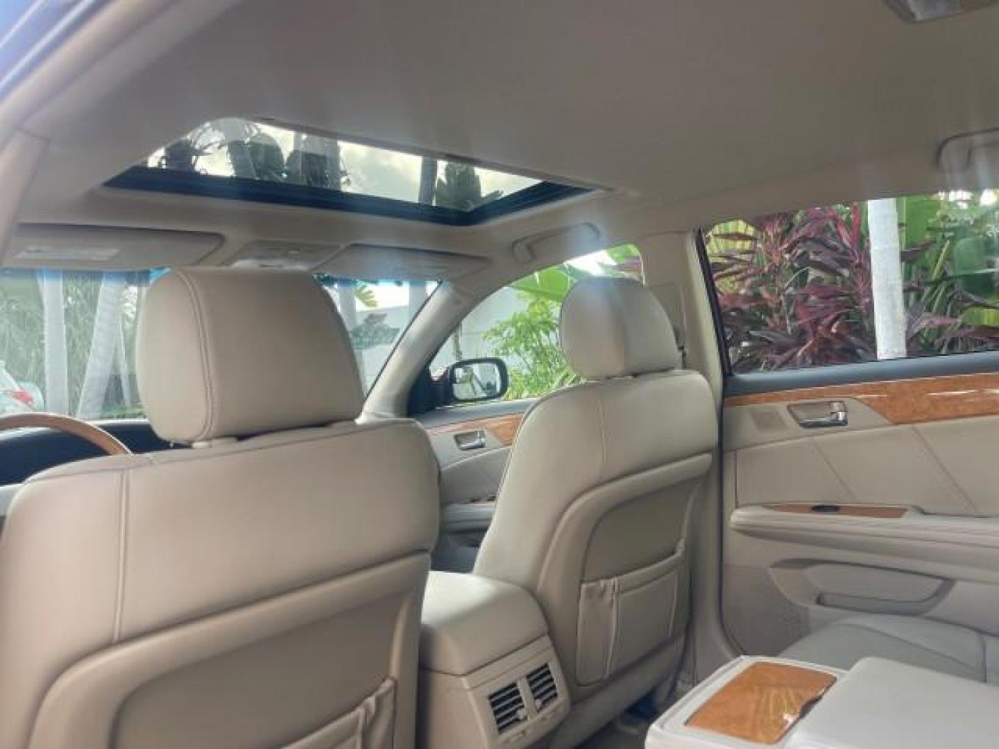 2006 Cassis Pearl /Ivory Toyota Avalon Limited 1 OWNER FL LOW MILES 49391 (4T1BK36B36U) with an 3.5L 24-Valve EFI DOHC V6 Engine engine, Automatic transmission, located at 4701 North Dixie Hwy, Pompano Beach, FL, 33064, (954) 422-2889, 26.240938, -80.123474 - OUR WEBPAGE FLORIDACARS1.COM HAS OVER 100 PHOTOS AND FREE CARFAX LINK 2006 TOYOTA AVALON LIMITED VIN: 4T1BK36B36U142787 4 T 1 B K 3 6 B 3 6 U 1 4 2 7 8 7 SEDAN 4 DR 3.5L V6 F DOHC 24V GASOLINE 31 MPG FRONT WHEEL DRIVE Features ABS Brakes Air Conditioning Alloy Wheels AM/FM Stereo Automatic Transmiss - Photo#73