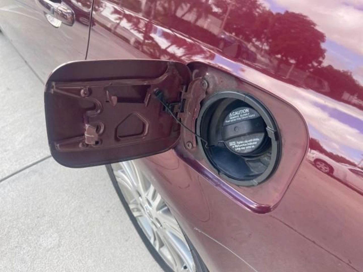 2006 Cassis Pearl /Ivory Toyota Avalon Limited 1 OWNER FL LOW MILES 49391 (4T1BK36B36U) with an 3.5L 24-Valve EFI DOHC V6 Engine engine, Automatic transmission, located at 4701 North Dixie Hwy, Pompano Beach, FL, 33064, (954) 422-2889, 26.240938, -80.123474 - OUR WEBPAGE FLORIDACARS1.COM HAS OVER 100 PHOTOS AND FREE CARFAX LINK 2006 TOYOTA AVALON LIMITED VIN: 4T1BK36B36U142787 4 T 1 B K 3 6 B 3 6 U 1 4 2 7 8 7 SEDAN 4 DR 3.5L V6 F DOHC 24V GASOLINE 31 MPG FRONT WHEEL DRIVE Features ABS Brakes Air Conditioning Alloy Wheels AM/FM Stereo Automatic Transmiss - Photo#82