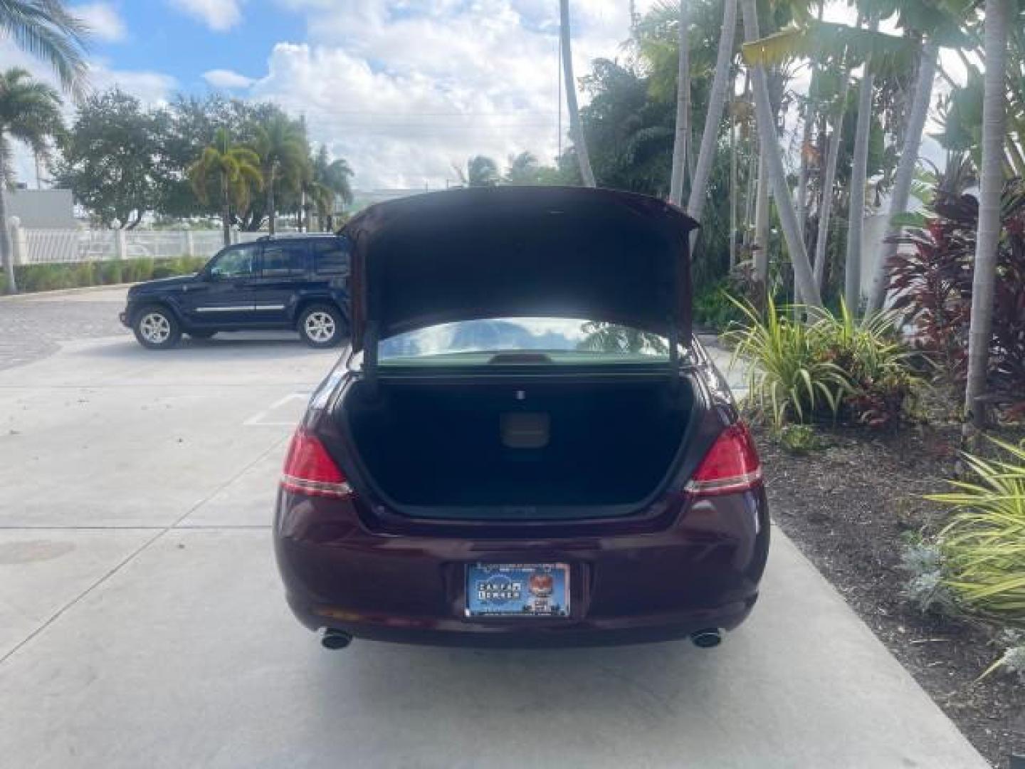2006 Cassis Pearl /Ivory Toyota Avalon Limited 1 OWNER FL LOW MILES 49391 (4T1BK36B36U) with an 3.5L 24-Valve EFI DOHC V6 Engine engine, Automatic transmission, located at 4701 North Dixie Hwy, Pompano Beach, FL, 33064, (954) 422-2889, 26.240938, -80.123474 - OUR WEBPAGE FLORIDACARS1.COM HAS OVER 100 PHOTOS AND FREE CARFAX LINK 2006 TOYOTA AVALON LIMITED VIN: 4T1BK36B36U142787 4 T 1 B K 3 6 B 3 6 U 1 4 2 7 8 7 SEDAN 4 DR 3.5L V6 F DOHC 24V GASOLINE 31 MPG FRONT WHEEL DRIVE Features ABS Brakes Air Conditioning Alloy Wheels AM/FM Stereo Automatic Transmiss - Photo#85