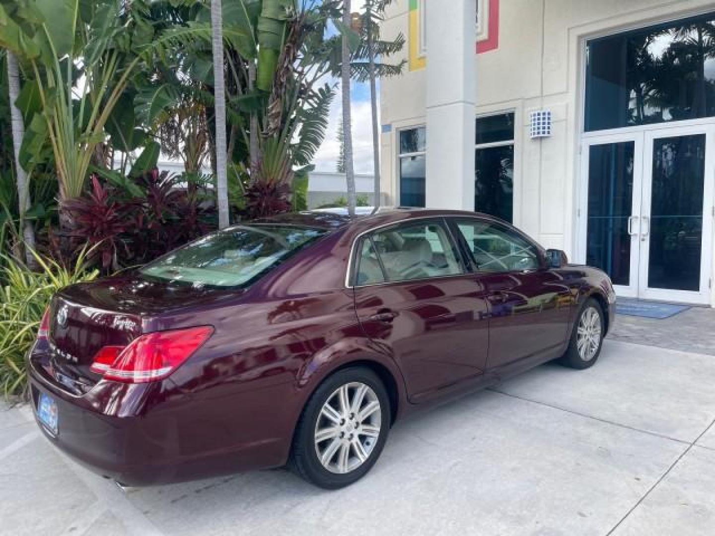 2006 Cassis Pearl /Ivory Toyota Avalon Limited 1 OWNER FL LOW MILES 49391 (4T1BK36B36U) with an 3.5L 24-Valve EFI DOHC V6 Engine engine, Automatic transmission, located at 4701 North Dixie Hwy, Pompano Beach, FL, 33064, (954) 422-2889, 26.240938, -80.123474 - OUR WEBPAGE FLORIDACARS1.COM HAS OVER 100 PHOTOS AND FREE CARFAX LINK 2006 TOYOTA AVALON LIMITED VIN: 4T1BK36B36U142787 4 T 1 B K 3 6 B 3 6 U 1 4 2 7 8 7 SEDAN 4 DR 3.5L V6 F DOHC 24V GASOLINE 31 MPG FRONT WHEEL DRIVE Features ABS Brakes Air Conditioning Alloy Wheels AM/FM Stereo Automatic Transmiss - Photo#95