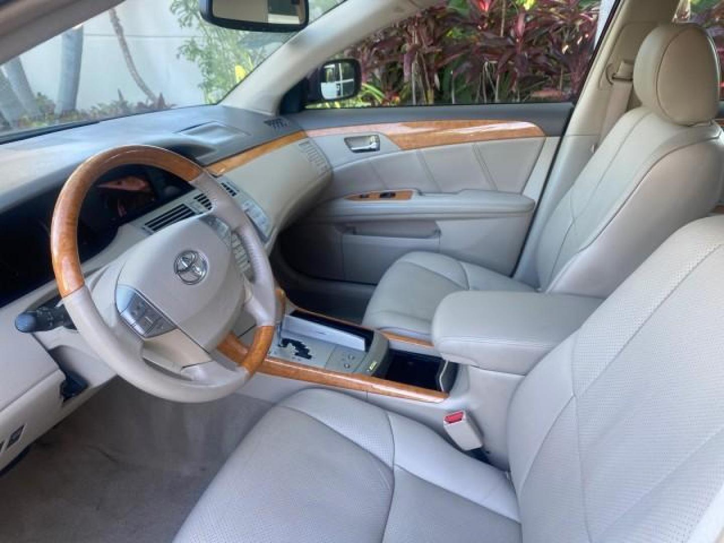 2006 Cassis Pearl /Ivory Toyota Avalon Limited 1 OWNER FL LOW MILES 49391 (4T1BK36B36U) with an 3.5L 24-Valve EFI DOHC V6 Engine engine, Automatic transmission, located at 4701 North Dixie Hwy, Pompano Beach, FL, 33064, (954) 422-2889, 26.240938, -80.123474 - OUR WEBPAGE FLORIDACARS1.COM HAS OVER 100 PHOTOS AND FREE CARFAX LINK 2006 TOYOTA AVALON LIMITED VIN: 4T1BK36B36U142787 4 T 1 B K 3 6 B 3 6 U 1 4 2 7 8 7 SEDAN 4 DR 3.5L V6 F DOHC 24V GASOLINE 31 MPG FRONT WHEEL DRIVE Features ABS Brakes Air Conditioning Alloy Wheels AM/FM Stereo Automatic Transmiss - Photo#44