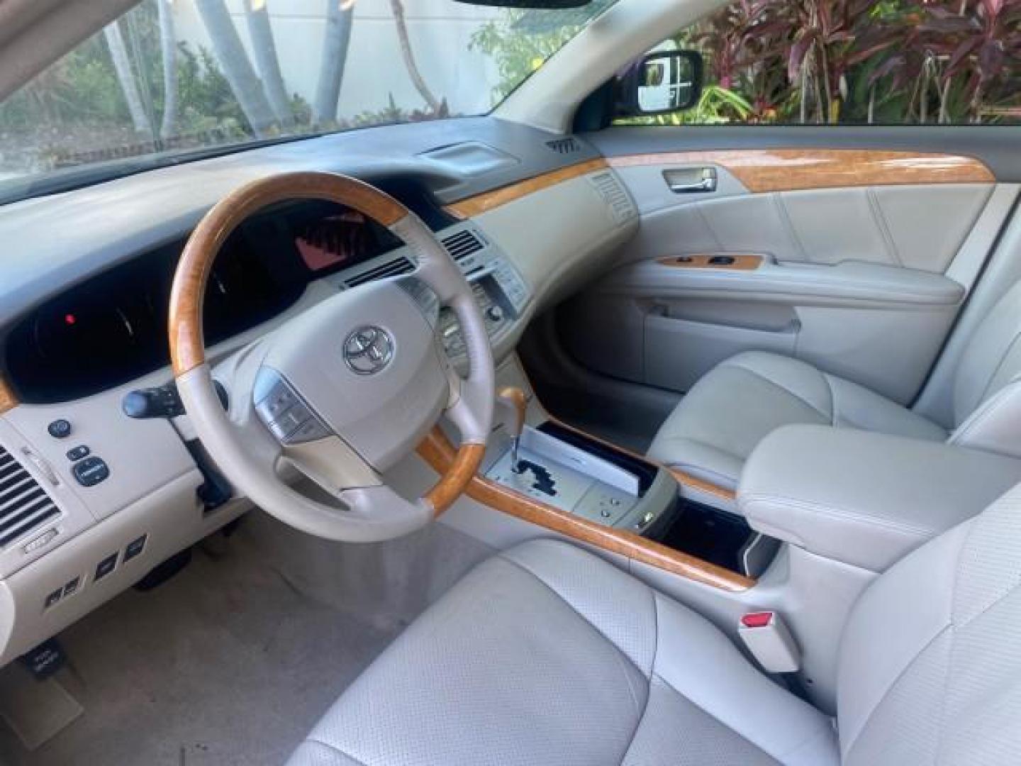 2006 Cassis Pearl /Ivory Toyota Avalon Limited 1 OWNER FL LOW MILES 49391 (4T1BK36B36U) with an 3.5L 24-Valve EFI DOHC V6 Engine engine, Automatic transmission, located at 4701 North Dixie Hwy, Pompano Beach, FL, 33064, (954) 422-2889, 26.240938, -80.123474 - OUR WEBPAGE FLORIDACARS1.COM HAS OVER 100 PHOTOS AND FREE CARFAX LINK 2006 TOYOTA AVALON LIMITED VIN: 4T1BK36B36U142787 4 T 1 B K 3 6 B 3 6 U 1 4 2 7 8 7 SEDAN 4 DR 3.5L V6 F DOHC 24V GASOLINE 31 MPG FRONT WHEEL DRIVE Features ABS Brakes Air Conditioning Alloy Wheels AM/FM Stereo Automatic Transmiss - Photo#45