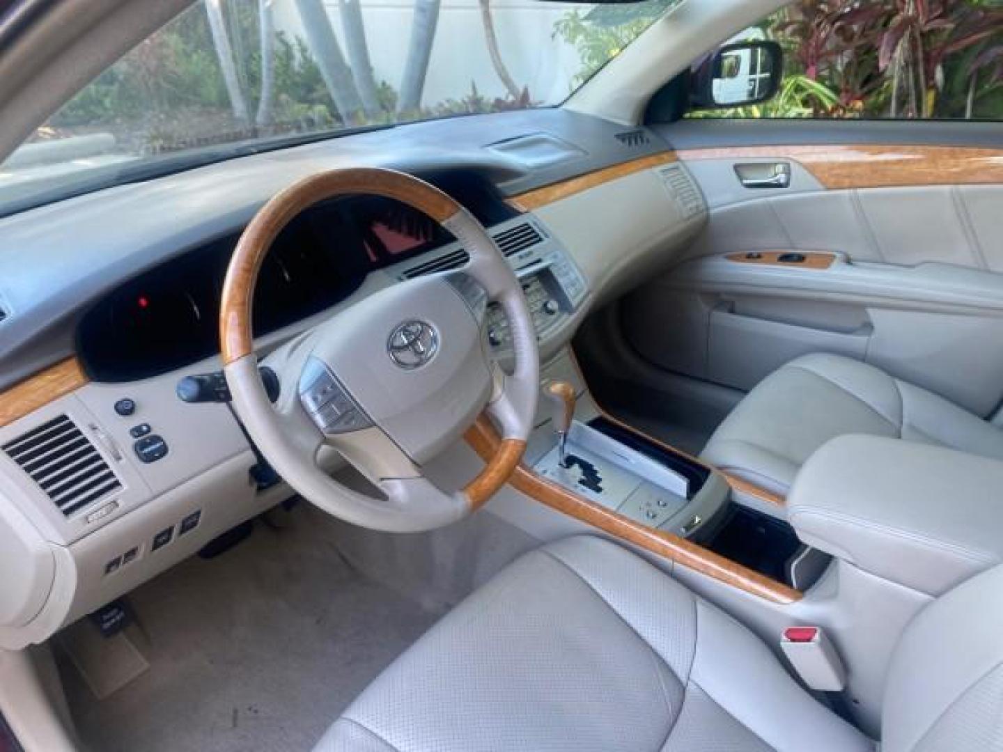 2006 Cassis Pearl /Ivory Toyota Avalon Limited 1 OWNER FL LOW MILES 49391 (4T1BK36B36U) with an 3.5L 24-Valve EFI DOHC V6 Engine engine, Automatic transmission, located at 4701 North Dixie Hwy, Pompano Beach, FL, 33064, (954) 422-2889, 26.240938, -80.123474 - OUR WEBPAGE FLORIDACARS1.COM HAS OVER 100 PHOTOS AND FREE CARFAX LINK 2006 TOYOTA AVALON LIMITED VIN: 4T1BK36B36U142787 4 T 1 B K 3 6 B 3 6 U 1 4 2 7 8 7 SEDAN 4 DR 3.5L V6 F DOHC 24V GASOLINE 31 MPG FRONT WHEEL DRIVE Features ABS Brakes Air Conditioning Alloy Wheels AM/FM Stereo Automatic Transmiss - Photo#46