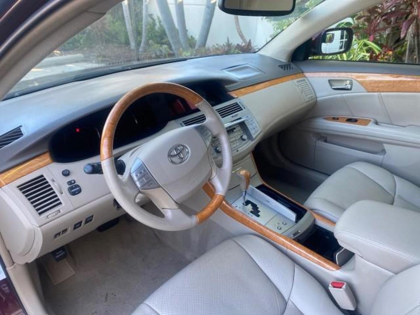 2006 Cassis Pearl /Ivory Toyota Avalon Limited 1 OWNER FL LOW MILES 49391 (4T1BK36B36U) with an 3.5L 24-Valve EFI DOHC V6 Engine engine, Automatic transmission, located at 4701 North Dixie Hwy, Pompano Beach, FL, 33064, (954) 422-2889, 26.240938, -80.123474 - OUR WEBPAGE FLORIDACARS1.COM HAS OVER 100 PHOTOS AND FREE CARFAX LINK 2006 TOYOTA AVALON LIMITED VIN: 4T1BK36B36U142787 4 T 1 B K 3 6 B 3 6 U 1 4 2 7 8 7 SEDAN 4 DR 3.5L V6 F DOHC 24V GASOLINE 31 MPG FRONT WHEEL DRIVE Features ABS Brakes Air Conditioning Alloy Wheels AM/FM Stereo Automatic Transmiss - Photo#47