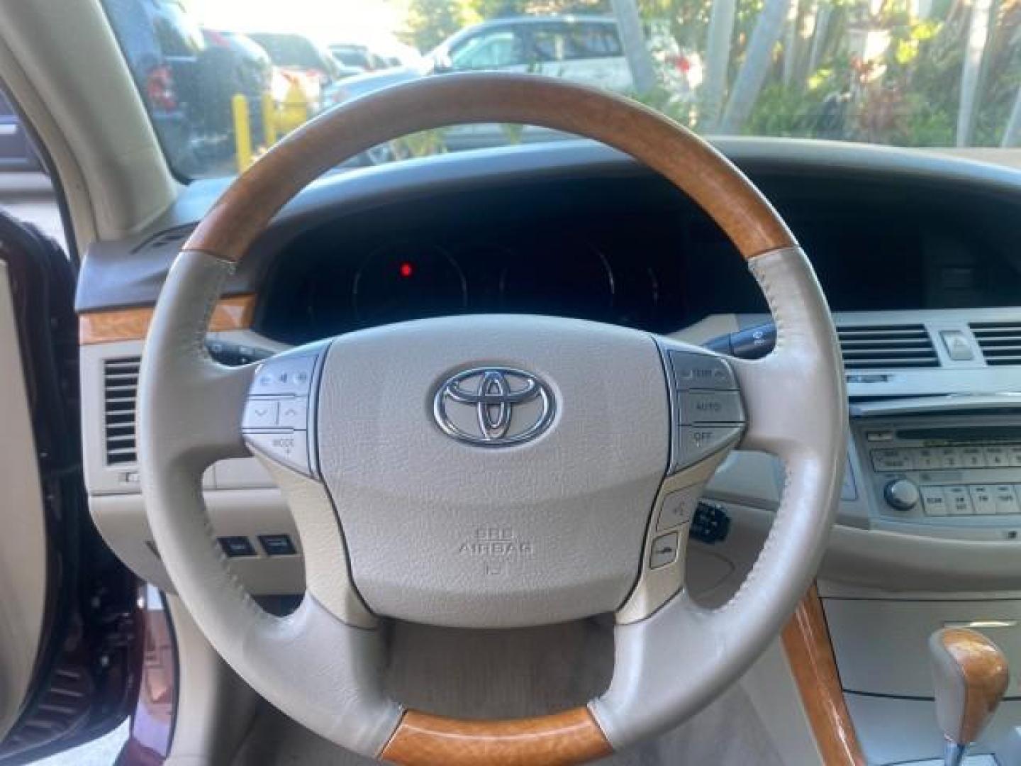 2006 Cassis Pearl /Ivory Toyota Avalon Limited 1 OWNER FL LOW MILES 49391 (4T1BK36B36U) with an 3.5L 24-Valve EFI DOHC V6 Engine engine, Automatic transmission, located at 4701 North Dixie Hwy, Pompano Beach, FL, 33064, (954) 422-2889, 26.240938, -80.123474 - OUR WEBPAGE FLORIDACARS1.COM HAS OVER 100 PHOTOS AND FREE CARFAX LINK 2006 TOYOTA AVALON LIMITED VIN: 4T1BK36B36U142787 4 T 1 B K 3 6 B 3 6 U 1 4 2 7 8 7 SEDAN 4 DR 3.5L V6 F DOHC 24V GASOLINE 31 MPG FRONT WHEEL DRIVE Features ABS Brakes Air Conditioning Alloy Wheels AM/FM Stereo Automatic Transmiss - Photo#48