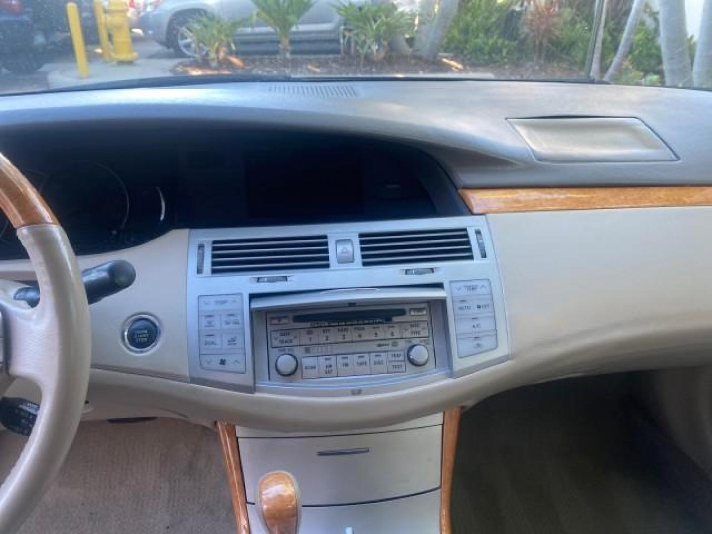 2006 Cassis Pearl /Ivory Toyota Avalon Limited 1 OWNER FL LOW MILES 49391 (4T1BK36B36U) with an 3.5L 24-Valve EFI DOHC V6 Engine engine, Automatic transmission, located at 4701 North Dixie Hwy, Pompano Beach, FL, 33064, (954) 422-2889, 26.240938, -80.123474 - OUR WEBPAGE FLORIDACARS1.COM HAS OVER 100 PHOTOS AND FREE CARFAX LINK 2006 TOYOTA AVALON LIMITED VIN: 4T1BK36B36U142787 4 T 1 B K 3 6 B 3 6 U 1 4 2 7 8 7 SEDAN 4 DR 3.5L V6 F DOHC 24V GASOLINE 31 MPG FRONT WHEEL DRIVE Features ABS Brakes Air Conditioning Alloy Wheels AM/FM Stereo Automatic Transmiss - Photo#55