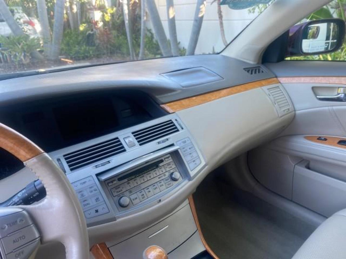 2006 Cassis Pearl /Ivory Toyota Avalon Limited 1 OWNER FL LOW MILES 49391 (4T1BK36B36U) with an 3.5L 24-Valve EFI DOHC V6 Engine engine, Automatic transmission, located at 4701 North Dixie Hwy, Pompano Beach, FL, 33064, (954) 422-2889, 26.240938, -80.123474 - OUR WEBPAGE FLORIDACARS1.COM HAS OVER 100 PHOTOS AND FREE CARFAX LINK 2006 TOYOTA AVALON LIMITED VIN: 4T1BK36B36U142787 4 T 1 B K 3 6 B 3 6 U 1 4 2 7 8 7 SEDAN 4 DR 3.5L V6 F DOHC 24V GASOLINE 31 MPG FRONT WHEEL DRIVE Features ABS Brakes Air Conditioning Alloy Wheels AM/FM Stereo Automatic Transmiss - Photo#56