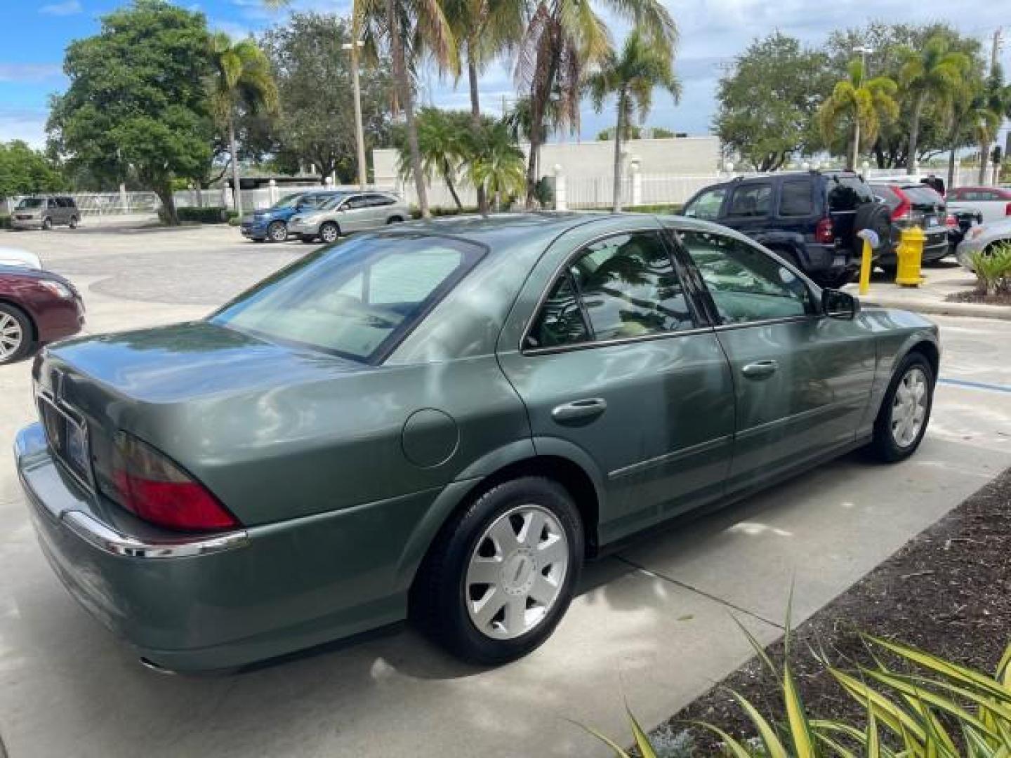 2005 Norsea Blue Metallic /Stone/Camel Lincoln LS LOW MILES 49882 1 OWNER FLORIDA (1LNHM86S05Y) with an 3.0L DOHC EFI 24-Valve V6 Engine engine, Automatic transmission, located at 4701 North Dixie Hwy, Pompano Beach, FL, 33064, (954) 422-2889, 26.240938, -80.123474 - OUR WEBPAGE FLORIDACARS1.COM HAS OVER 100 PHOTOS AND FREE CARFAX LINK 2005 LINCOLN LS LUXURY VIN: 1LNHM86S05Y614694 1 L N H M 8 6 S 0 5 Y 6 1 4 6 9 4 SEDAN 4 DR 3.0L V6 F DOHC GASOLINE REAR WHEEL DRIVE Features ABS Brakes Air Conditioning Alloy Wheels AM/FM Stereo Automatic Transmission Cassette Pla - Photo#7