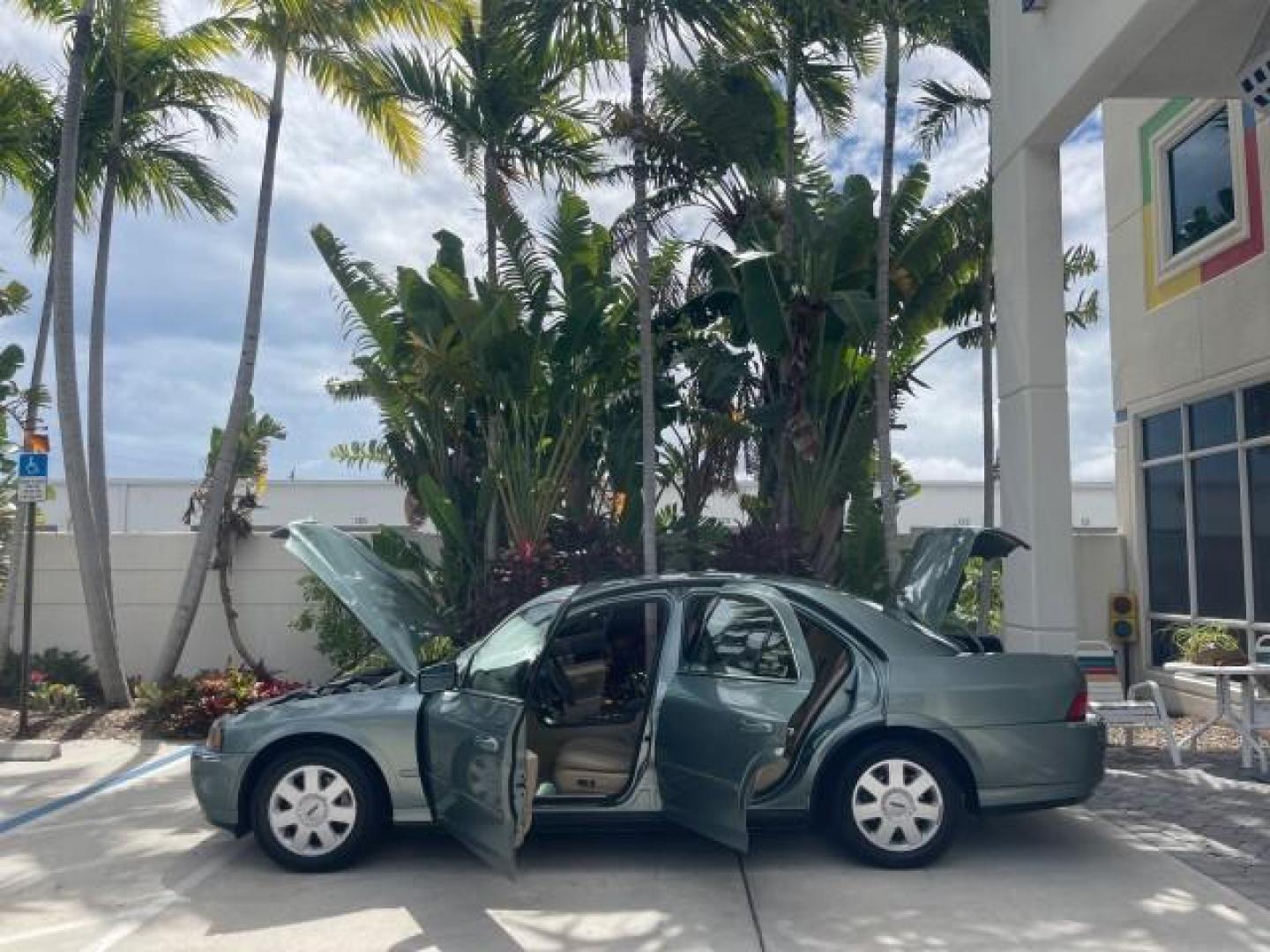 2005 Norsea Blue Metallic /Stone/Camel Lincoln LS LOW MILES 49882 1 OWNER FLORIDA (1LNHM86S05Y) with an 3.0L DOHC EFI 24-Valve V6 Engine engine, Automatic transmission, located at 4701 North Dixie Hwy, Pompano Beach, FL, 33064, (954) 422-2889, 26.240938, -80.123474 - OUR WEBPAGE FLORIDACARS1.COM HAS OVER 100 PHOTOS AND FREE CARFAX LINK 2005 LINCOLN LS LUXURY VIN: 1LNHM86S05Y614694 1 L N H M 8 6 S 0 5 Y 6 1 4 6 9 4 SEDAN 4 DR 3.0L V6 F DOHC GASOLINE REAR WHEEL DRIVE Features ABS Brakes Air Conditioning Alloy Wheels AM/FM Stereo Automatic Transmission Cassette Pla - Photo#8