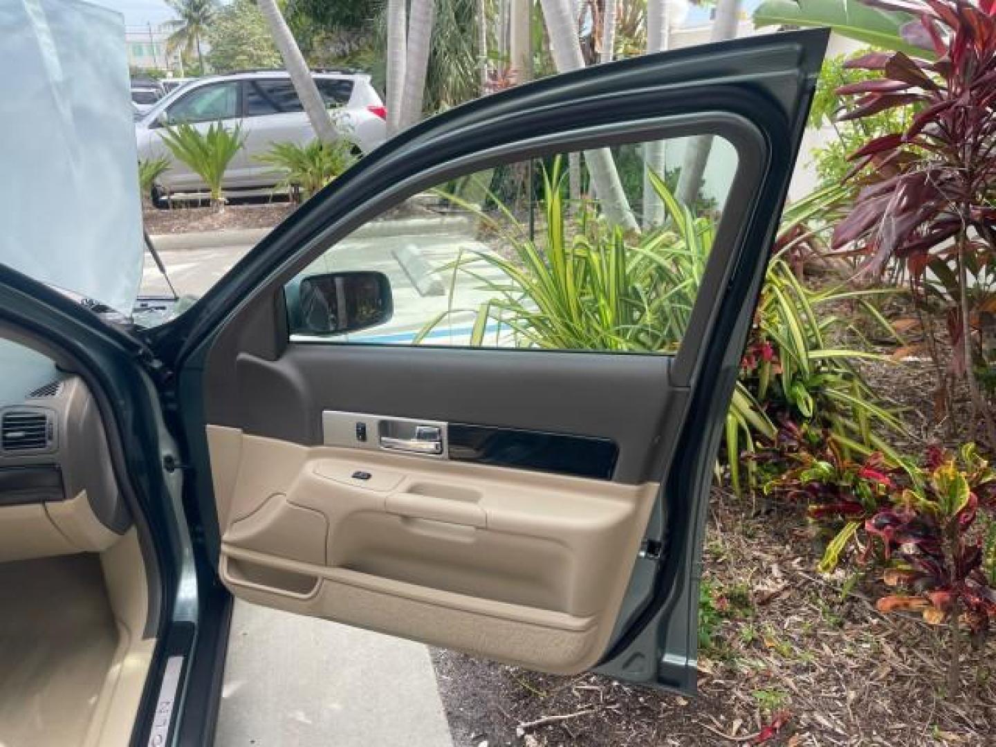 2005 Norsea Blue Metallic /Stone/Camel Lincoln LS LOW MILES 49882 1 OWNER FLORIDA (1LNHM86S05Y) with an 3.0L DOHC EFI 24-Valve V6 Engine engine, Automatic transmission, located at 4701 North Dixie Hwy, Pompano Beach, FL, 33064, (954) 422-2889, 26.240938, -80.123474 - OUR WEBPAGE FLORIDACARS1.COM HAS OVER 100 PHOTOS AND FREE CARFAX LINK 2005 LINCOLN LS LUXURY VIN: 1LNHM86S05Y614694 1 L N H M 8 6 S 0 5 Y 6 1 4 6 9 4 SEDAN 4 DR 3.0L V6 F DOHC GASOLINE REAR WHEEL DRIVE Features ABS Brakes Air Conditioning Alloy Wheels AM/FM Stereo Automatic Transmission Cassette Pla - Photo#11