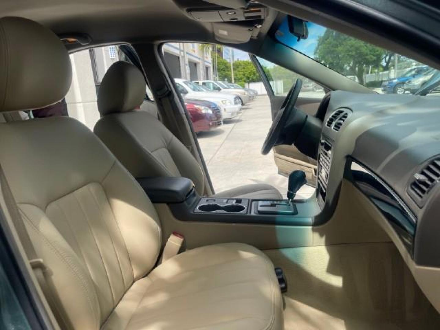 2005 Norsea Blue Metallic /Stone/Camel Lincoln LS LOW MILES 49882 1 OWNER FLORIDA (1LNHM86S05Y) with an 3.0L DOHC EFI 24-Valve V6 Engine engine, Automatic transmission, located at 4701 North Dixie Hwy, Pompano Beach, FL, 33064, (954) 422-2889, 26.240938, -80.123474 - OUR WEBPAGE FLORIDACARS1.COM HAS OVER 100 PHOTOS AND FREE CARFAX LINK 2005 LINCOLN LS LUXURY VIN: 1LNHM86S05Y614694 1 L N H M 8 6 S 0 5 Y 6 1 4 6 9 4 SEDAN 4 DR 3.0L V6 F DOHC GASOLINE REAR WHEEL DRIVE Features ABS Brakes Air Conditioning Alloy Wheels AM/FM Stereo Automatic Transmission Cassette Pla - Photo#12