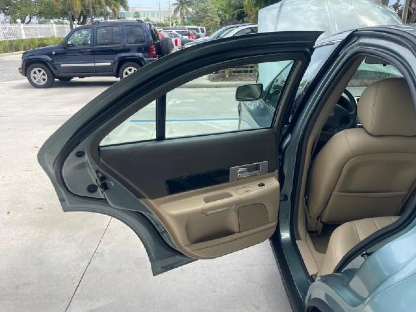 2005 Norsea Blue Metallic /Stone/Camel Lincoln LS LOW MILES 49882 1 OWNER FLORIDA (1LNHM86S05Y) with an 3.0L DOHC EFI 24-Valve V6 Engine engine, Automatic transmission, located at 4701 North Dixie Hwy, Pompano Beach, FL, 33064, (954) 422-2889, 26.240938, -80.123474 - OUR WEBPAGE FLORIDACARS1.COM HAS OVER 100 PHOTOS AND FREE CARFAX LINK 2005 LINCOLN LS LUXURY VIN: 1LNHM86S05Y614694 1 L N H M 8 6 S 0 5 Y 6 1 4 6 9 4 SEDAN 4 DR 3.0L V6 F DOHC GASOLINE REAR WHEEL DRIVE Features ABS Brakes Air Conditioning Alloy Wheels AM/FM Stereo Automatic Transmission Cassette Pla - Photo#13