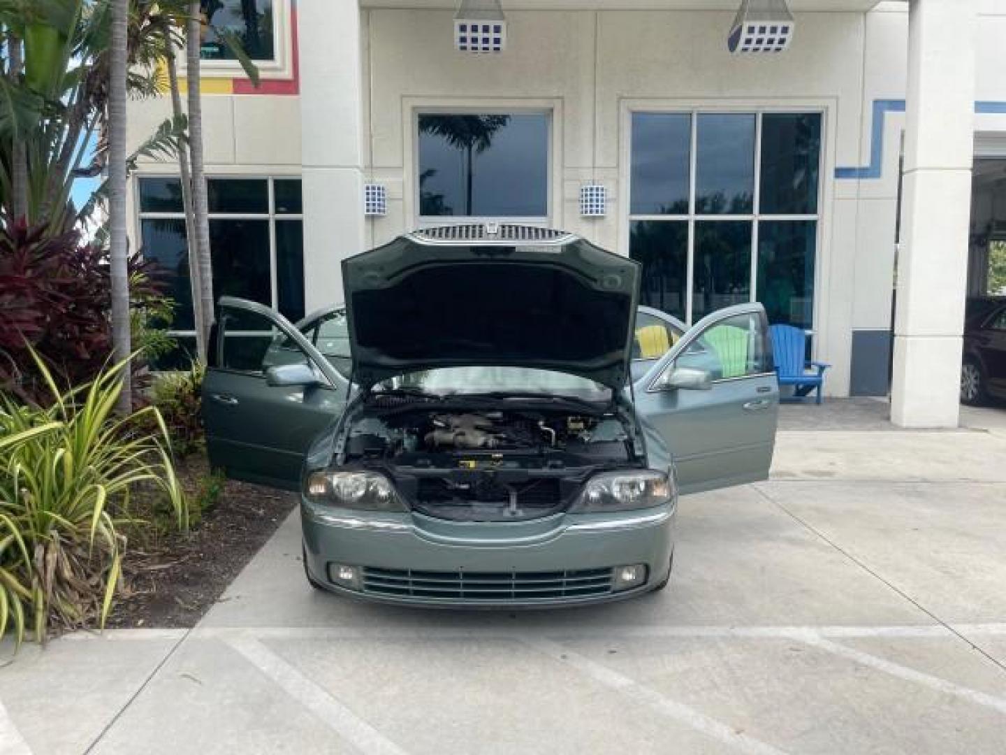 2005 Norsea Blue Metallic /Stone/Camel Lincoln LS LOW MILES 49882 1 OWNER FLORIDA (1LNHM86S05Y) with an 3.0L DOHC EFI 24-Valve V6 Engine engine, Automatic transmission, located at 4701 North Dixie Hwy, Pompano Beach, FL, 33064, (954) 422-2889, 26.240938, -80.123474 - OUR WEBPAGE FLORIDACARS1.COM HAS OVER 100 PHOTOS AND FREE CARFAX LINK 2005 LINCOLN LS LUXURY VIN: 1LNHM86S05Y614694 1 L N H M 8 6 S 0 5 Y 6 1 4 6 9 4 SEDAN 4 DR 3.0L V6 F DOHC GASOLINE REAR WHEEL DRIVE Features ABS Brakes Air Conditioning Alloy Wheels AM/FM Stereo Automatic Transmission Cassette Pla - Photo#16