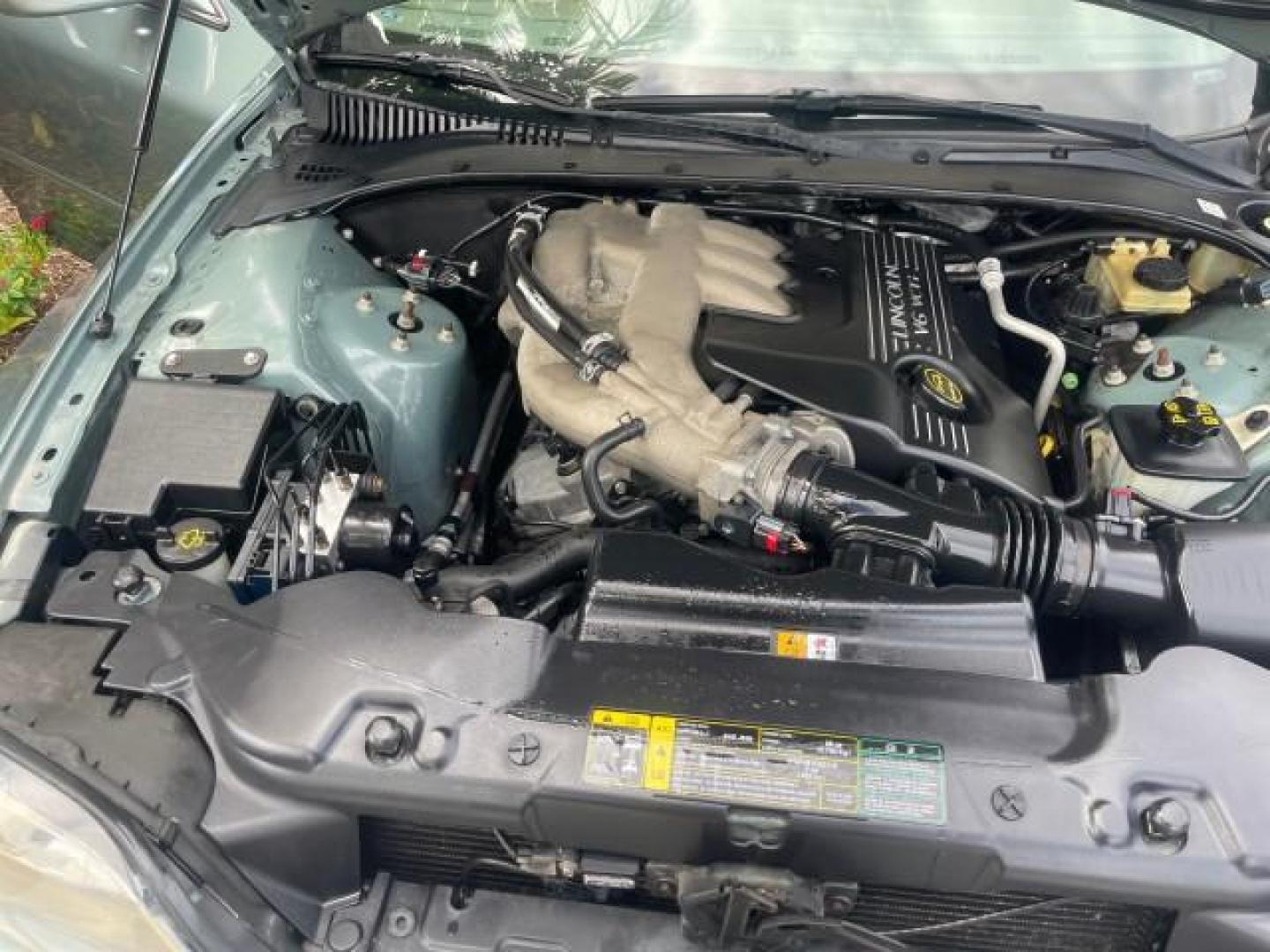 2005 Norsea Blue Metallic /Stone/Camel Lincoln LS LOW MILES 49882 1 OWNER FLORIDA (1LNHM86S05Y) with an 3.0L DOHC EFI 24-Valve V6 Engine engine, Automatic transmission, located at 4701 North Dixie Hwy, Pompano Beach, FL, 33064, (954) 422-2889, 26.240938, -80.123474 - OUR WEBPAGE FLORIDACARS1.COM HAS OVER 100 PHOTOS AND FREE CARFAX LINK 2005 LINCOLN LS LUXURY VIN: 1LNHM86S05Y614694 1 L N H M 8 6 S 0 5 Y 6 1 4 6 9 4 SEDAN 4 DR 3.0L V6 F DOHC GASOLINE REAR WHEEL DRIVE Features ABS Brakes Air Conditioning Alloy Wheels AM/FM Stereo Automatic Transmission Cassette Pla - Photo#25
