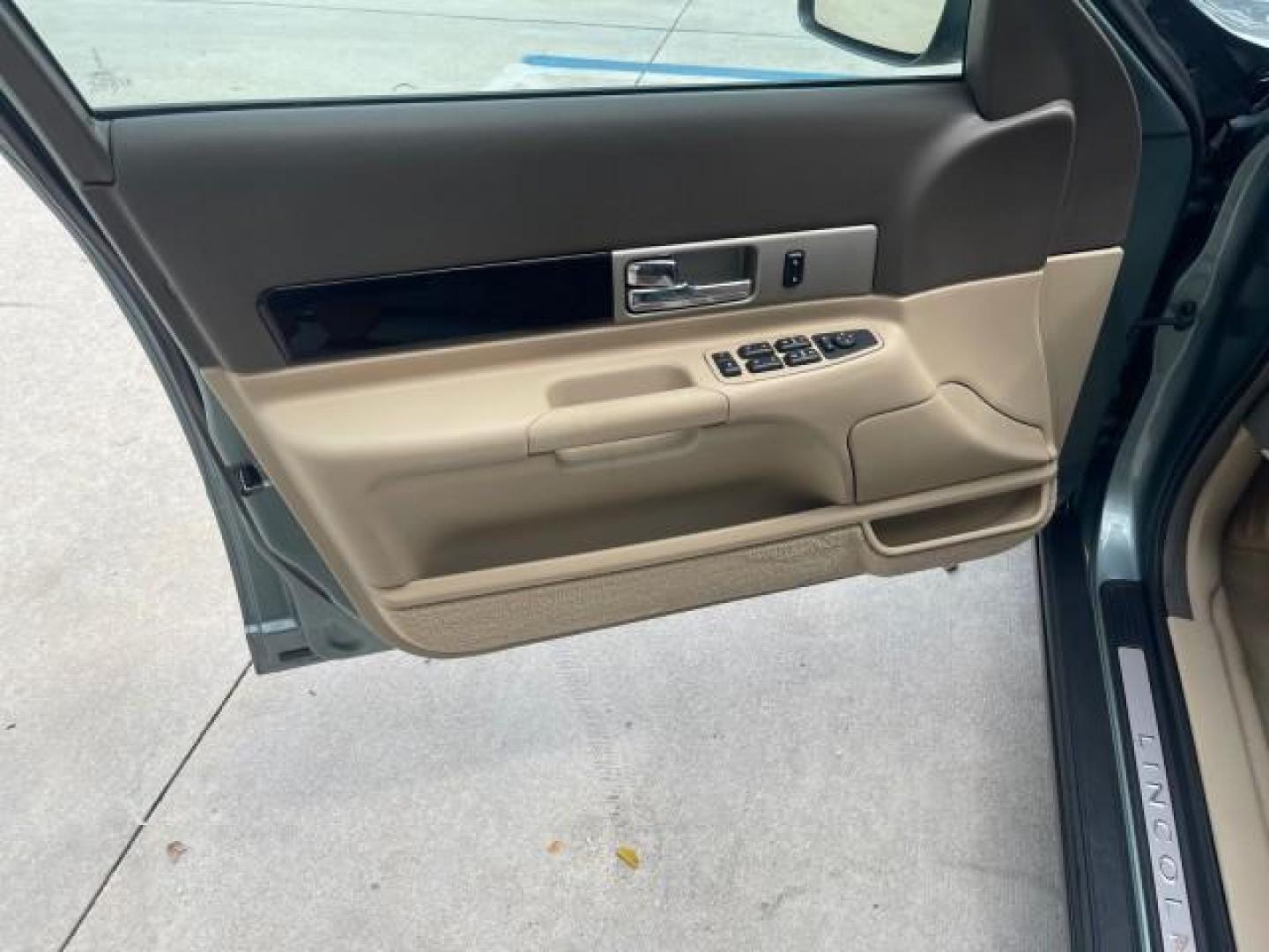 2005 Norsea Blue Metallic /Stone/Camel Lincoln LS LOW MILES 49882 1 OWNER FLORIDA (1LNHM86S05Y) with an 3.0L DOHC EFI 24-Valve V6 Engine engine, Automatic transmission, located at 4701 North Dixie Hwy, Pompano Beach, FL, 33064, (954) 422-2889, 26.240938, -80.123474 - OUR WEBPAGE FLORIDACARS1.COM HAS OVER 100 PHOTOS AND FREE CARFAX LINK 2005 LINCOLN LS LUXURY VIN: 1LNHM86S05Y614694 1 L N H M 8 6 S 0 5 Y 6 1 4 6 9 4 SEDAN 4 DR 3.0L V6 F DOHC GASOLINE REAR WHEEL DRIVE Features ABS Brakes Air Conditioning Alloy Wheels AM/FM Stereo Automatic Transmission Cassette Pla - Photo#41