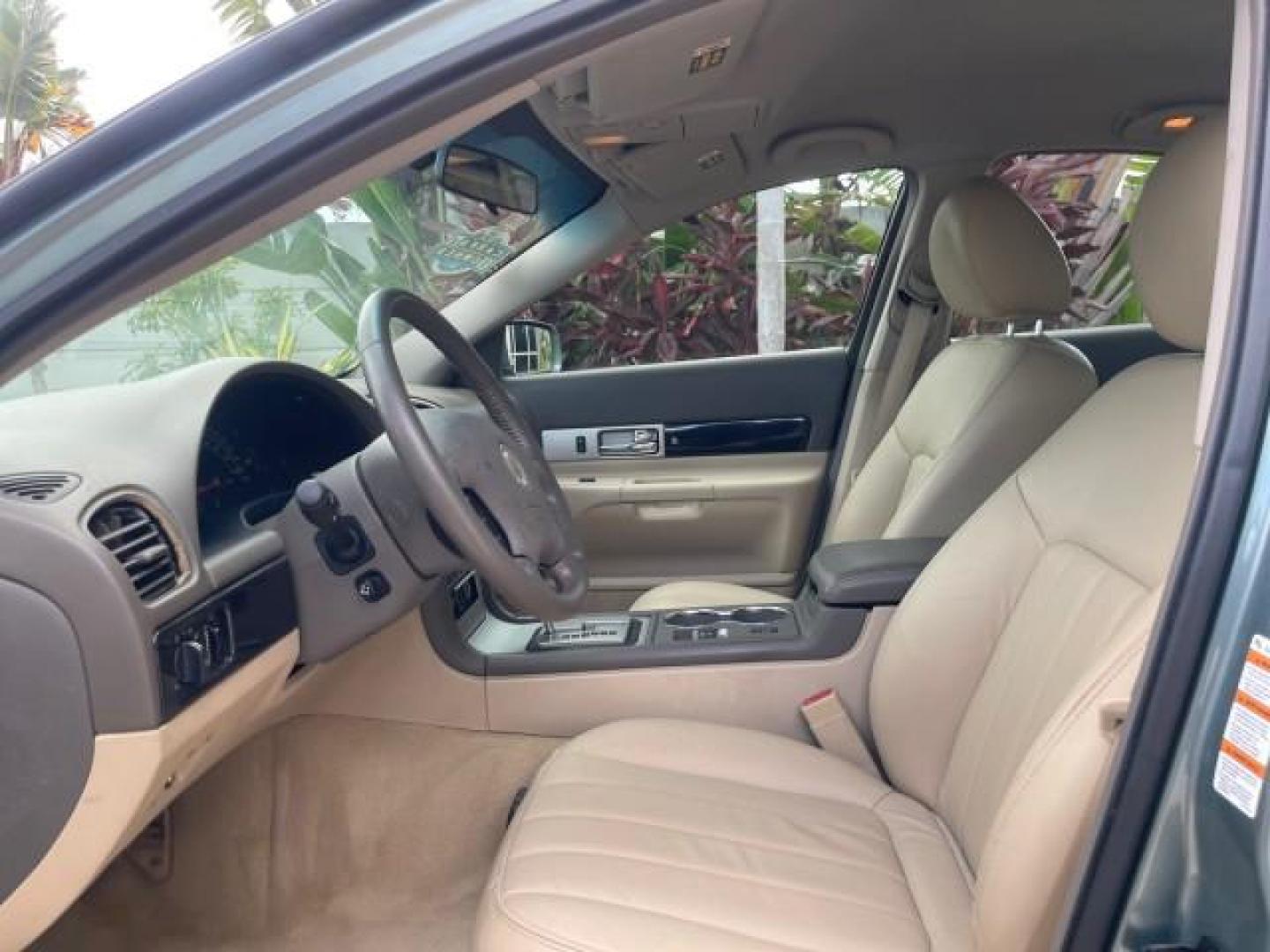 2005 Norsea Blue Metallic /Stone/Camel Lincoln LS LOW MILES 49882 1 OWNER FLORIDA (1LNHM86S05Y) with an 3.0L DOHC EFI 24-Valve V6 Engine engine, Automatic transmission, located at 4701 North Dixie Hwy, Pompano Beach, FL, 33064, (954) 422-2889, 26.240938, -80.123474 - OUR WEBPAGE FLORIDACARS1.COM HAS OVER 100 PHOTOS AND FREE CARFAX LINK 2005 LINCOLN LS LUXURY VIN: 1LNHM86S05Y614694 1 L N H M 8 6 S 0 5 Y 6 1 4 6 9 4 SEDAN 4 DR 3.0L V6 F DOHC GASOLINE REAR WHEEL DRIVE Features ABS Brakes Air Conditioning Alloy Wheels AM/FM Stereo Automatic Transmission Cassette Pla - Photo#46