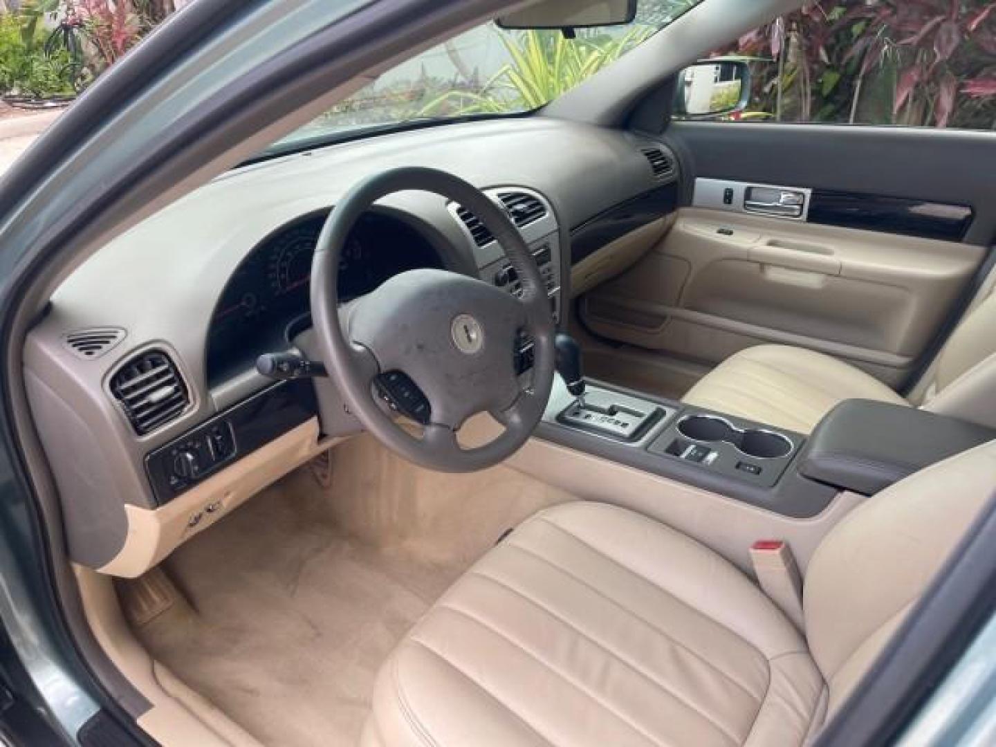 2005 Norsea Blue Metallic /Stone/Camel Lincoln LS LOW MILES 49882 1 OWNER FLORIDA (1LNHM86S05Y) with an 3.0L DOHC EFI 24-Valve V6 Engine engine, Automatic transmission, located at 4701 North Dixie Hwy, Pompano Beach, FL, 33064, (954) 422-2889, 26.240938, -80.123474 - OUR WEBPAGE FLORIDACARS1.COM HAS OVER 100 PHOTOS AND FREE CARFAX LINK 2005 LINCOLN LS LUXURY VIN: 1LNHM86S05Y614694 1 L N H M 8 6 S 0 5 Y 6 1 4 6 9 4 SEDAN 4 DR 3.0L V6 F DOHC GASOLINE REAR WHEEL DRIVE Features ABS Brakes Air Conditioning Alloy Wheels AM/FM Stereo Automatic Transmission Cassette Pla - Photo#48