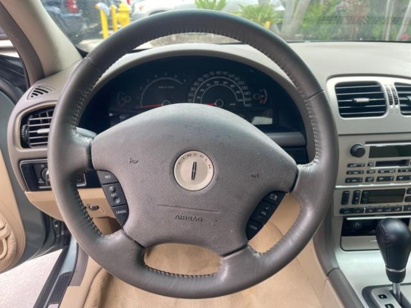 2005 Norsea Blue Metallic /Stone/Camel Lincoln LS LOW MILES 49882 1 OWNER FLORIDA (1LNHM86S05Y) with an 3.0L DOHC EFI 24-Valve V6 Engine engine, Automatic transmission, located at 4701 North Dixie Hwy, Pompano Beach, FL, 33064, (954) 422-2889, 26.240938, -80.123474 - OUR WEBPAGE FLORIDACARS1.COM HAS OVER 100 PHOTOS AND FREE CARFAX LINK 2005 LINCOLN LS LUXURY VIN: 1LNHM86S05Y614694 1 L N H M 8 6 S 0 5 Y 6 1 4 6 9 4 SEDAN 4 DR 3.0L V6 F DOHC GASOLINE REAR WHEEL DRIVE Features ABS Brakes Air Conditioning Alloy Wheels AM/FM Stereo Automatic Transmission Cassette Pla - Photo#50