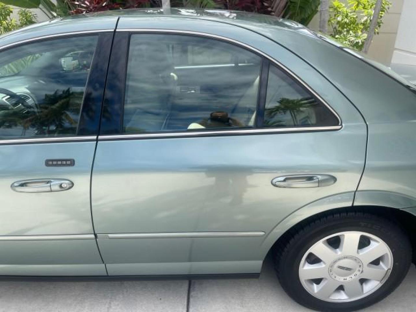 2005 Norsea Blue Metallic /Stone/Camel Lincoln LS LOW MILES 49882 1 OWNER FLORIDA (1LNHM86S05Y) with an 3.0L DOHC EFI 24-Valve V6 Engine engine, Automatic transmission, located at 4701 North Dixie Hwy, Pompano Beach, FL, 33064, (954) 422-2889, 26.240938, -80.123474 - OUR WEBPAGE FLORIDACARS1.COM HAS OVER 100 PHOTOS AND FREE CARFAX LINK 2005 LINCOLN LS LUXURY VIN: 1LNHM86S05Y614694 1 L N H M 8 6 S 0 5 Y 6 1 4 6 9 4 SEDAN 4 DR 3.0L V6 F DOHC GASOLINE REAR WHEEL DRIVE Features ABS Brakes Air Conditioning Alloy Wheels AM/FM Stereo Automatic Transmission Cassette Pla - Photo#72