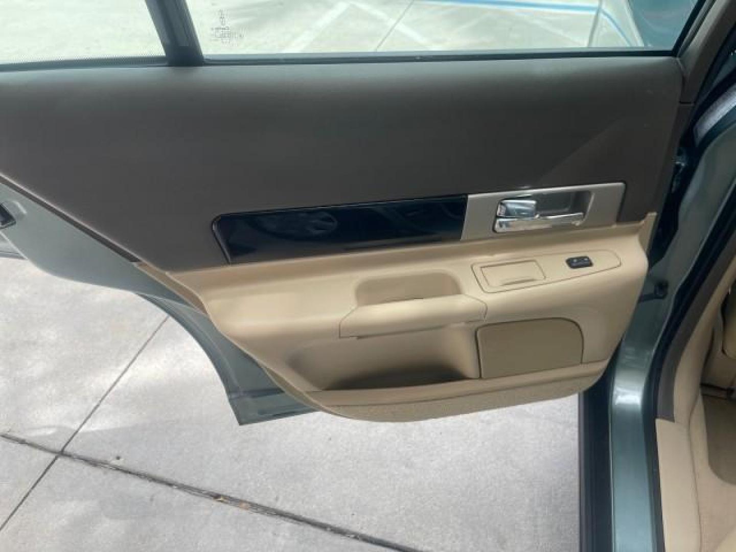 2005 Norsea Blue Metallic /Stone/Camel Lincoln LS LOW MILES 49882 1 OWNER FLORIDA (1LNHM86S05Y) with an 3.0L DOHC EFI 24-Valve V6 Engine engine, Automatic transmission, located at 4701 North Dixie Hwy, Pompano Beach, FL, 33064, (954) 422-2889, 26.240938, -80.123474 - OUR WEBPAGE FLORIDACARS1.COM HAS OVER 100 PHOTOS AND FREE CARFAX LINK 2005 LINCOLN LS LUXURY VIN: 1LNHM86S05Y614694 1 L N H M 8 6 S 0 5 Y 6 1 4 6 9 4 SEDAN 4 DR 3.0L V6 F DOHC GASOLINE REAR WHEEL DRIVE Features ABS Brakes Air Conditioning Alloy Wheels AM/FM Stereo Automatic Transmission Cassette Pla - Photo#74