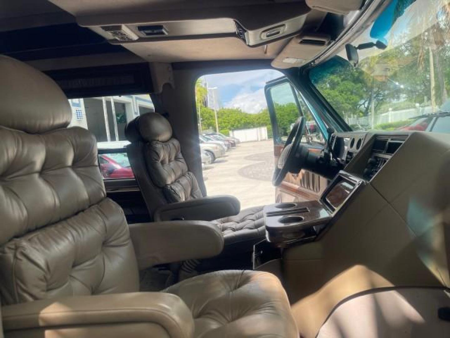 1995 GMC Vandura CONVERSION VAN LOW MILES 68,220 (1GDEG25K5SF) with an 5.7L EFI V8 Engine engine, Automatic transmission, located at 4701 North Dixie Hwy, Pompano Beach, FL, 33064, (954) 422-2889, 26.240938, -80.123474 - OUR WEBPAGE FLORIDACARS1.COM HAS OVER 100 PHOTOS AND FREE CARFAX LINK 1995 GMC RALLY/VANDURA G2500 VIN: 1GDEG25K5SF556971 1 G D E G 2 5 K 5 S F 5 5 6 9 7 1 VAN 5.7L V8 F - This is the best motor ever built. GASOLINE REAR WHEEL DRIVE Features ABS Brakes Air Conditioning Alloy Wheels AM/FM Stereo Auto - Photo#12