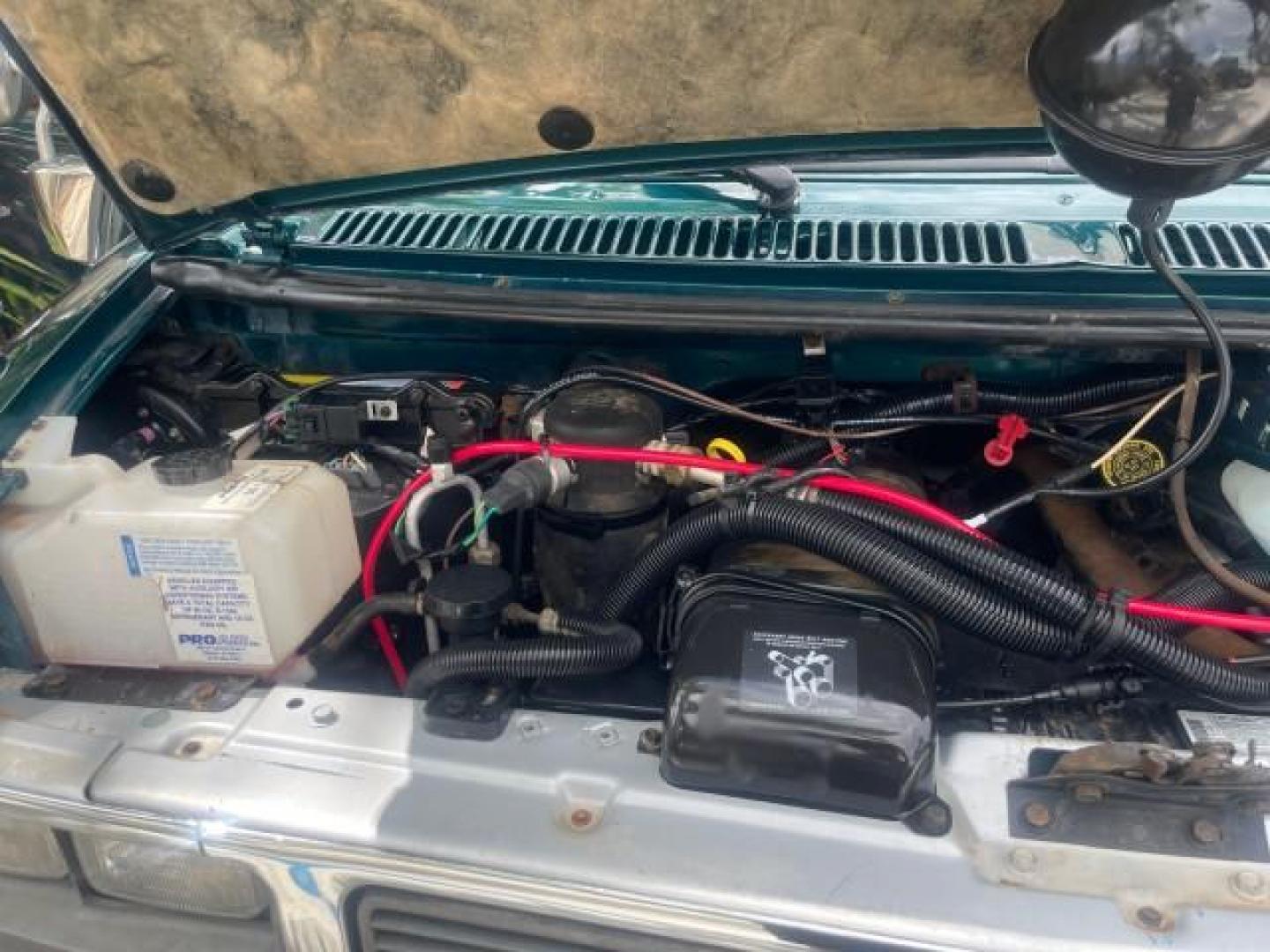 1995 GMC Vandura CONVERSION VAN LOW MILES 68,220 (1GDEG25K5SF) with an 5.7L EFI V8 Engine engine, Automatic transmission, located at 4701 North Dixie Hwy, Pompano Beach, FL, 33064, (954) 422-2889, 26.240938, -80.123474 - OUR WEBPAGE FLORIDACARS1.COM HAS OVER 100 PHOTOS AND FREE CARFAX LINK 1995 GMC RALLY/VANDURA G2500 VIN: 1GDEG25K5SF556971 1 G D E G 2 5 K 5 S F 5 5 6 9 7 1 VAN 5.7L V8 F - This is the best motor ever built. GASOLINE REAR WHEEL DRIVE Features ABS Brakes Air Conditioning Alloy Wheels AM/FM Stereo Auto - Photo#25