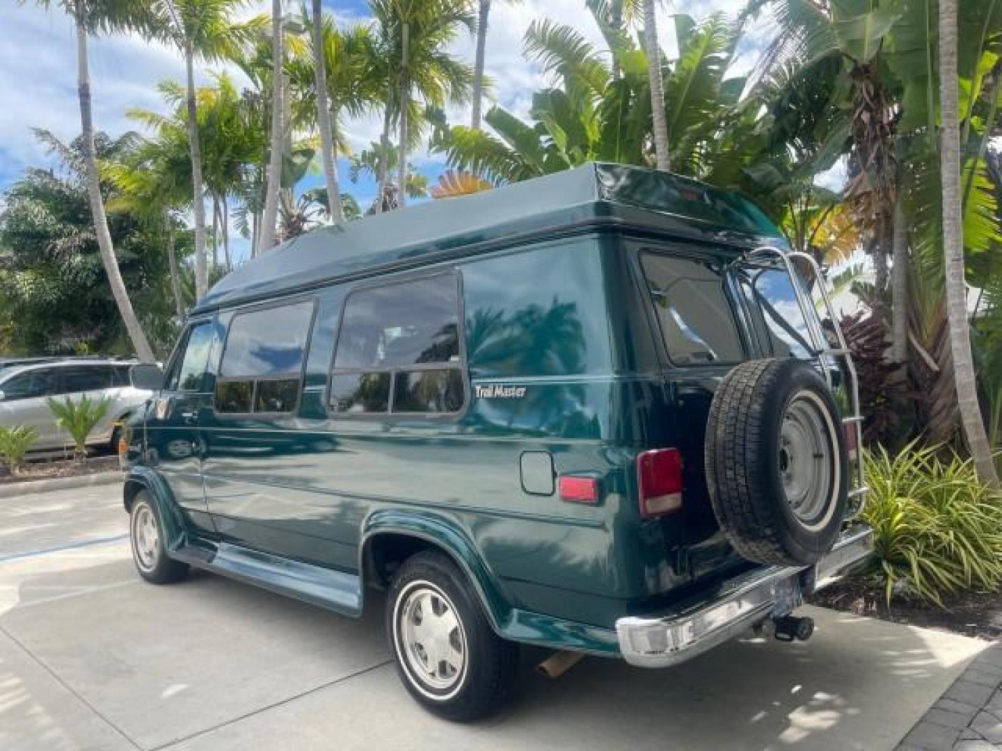 1995 GMC Vandura CONVERSION VAN LOW MILES 68,220 (1GDEG25K5SF) with an 5.7L EFI V8 Engine engine, Automatic transmission, located at 4701 North Dixie Hwy, Pompano Beach, FL, 33064, (954) 422-2889, 26.240938, -80.123474 - OUR WEBPAGE FLORIDACARS1.COM HAS OVER 100 PHOTOS AND FREE CARFAX LINK 1995 GMC RALLY/VANDURA G2500 VIN: 1GDEG25K5SF556971 1 G D E G 2 5 K 5 S F 5 5 6 9 7 1 VAN 5.7L V8 F - This is the best motor ever built. GASOLINE REAR WHEEL DRIVE Features ABS Brakes Air Conditioning Alloy Wheels AM/FM Stereo Auto - Photo#34