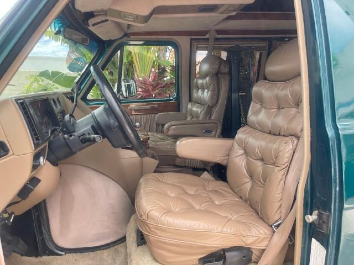 1995 GMC Vandura CONVERSION VAN LOW MILES 68,220 (1GDEG25K5SF) with an 5.7L EFI V8 Engine engine, Automatic transmission, located at 4701 North Dixie Hwy, Pompano Beach, FL, 33064, (954) 422-2889, 26.240938, -80.123474 - OUR WEBPAGE FLORIDACARS1.COM HAS OVER 100 PHOTOS AND FREE CARFAX LINK 1995 GMC RALLY/VANDURA G2500 VIN: 1GDEG25K5SF556971 1 G D E G 2 5 K 5 S F 5 5 6 9 7 1 VAN 5.7L V8 F - This is the best motor ever built. GASOLINE REAR WHEEL DRIVE Features ABS Brakes Air Conditioning Alloy Wheels AM/FM Stereo Auto - Photo#44