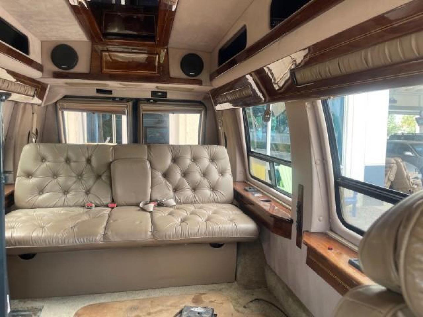 1995 GMC Vandura CONVERSION VAN LOW MILES 68,220 (1GDEG25K5SF) with an 5.7L EFI V8 Engine engine, Automatic transmission, located at 4701 North Dixie Hwy, Pompano Beach, FL, 33064, (954) 422-2889, 26.240938, -80.123474 - OUR WEBPAGE FLORIDACARS1.COM HAS OVER 100 PHOTOS AND FREE CARFAX LINK 1995 GMC RALLY/VANDURA G2500 VIN: 1GDEG25K5SF556971 1 G D E G 2 5 K 5 S F 5 5 6 9 7 1 VAN 5.7L V8 F - This is the best motor ever built. GASOLINE REAR WHEEL DRIVE Features ABS Brakes Air Conditioning Alloy Wheels AM/FM Stereo Auto - Photo#71