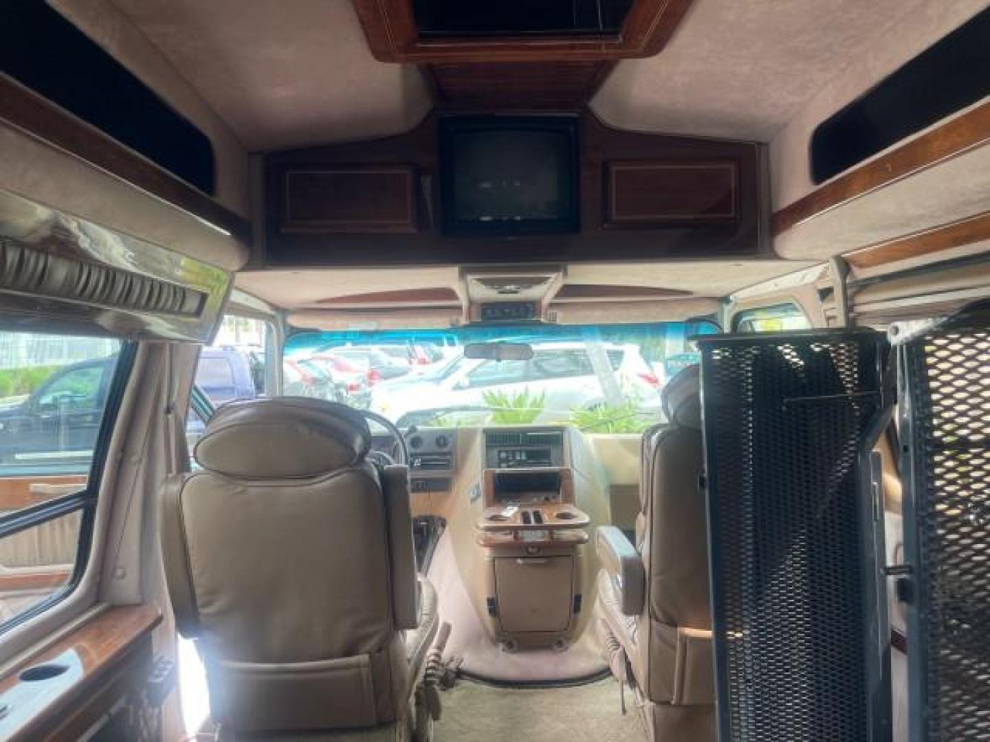 1995 GMC Vandura CONVERSION VAN LOW MILES 68,220 (1GDEG25K5SF) with an 5.7L EFI V8 Engine engine, Automatic transmission, located at 4701 North Dixie Hwy, Pompano Beach, FL, 33064, (954) 422-2889, 26.240938, -80.123474 - OUR WEBPAGE FLORIDACARS1.COM HAS OVER 100 PHOTOS AND FREE CARFAX LINK 1995 GMC RALLY/VANDURA G2500 VIN: 1GDEG25K5SF556971 1 G D E G 2 5 K 5 S F 5 5 6 9 7 1 VAN 5.7L V8 F - This is the best motor ever built. GASOLINE REAR WHEEL DRIVE Features ABS Brakes Air Conditioning Alloy Wheels AM/FM Stereo Auto - Photo#73