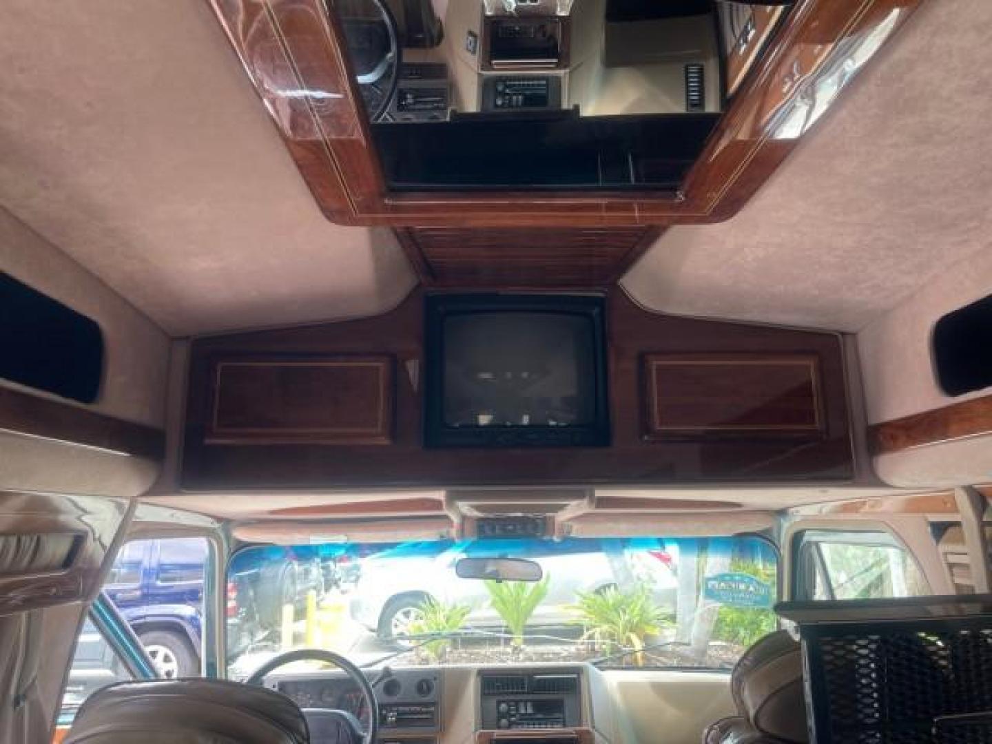 1995 GMC Vandura CONVERSION VAN LOW MILES 68,220 (1GDEG25K5SF) with an 5.7L EFI V8 Engine engine, Automatic transmission, located at 4701 North Dixie Hwy, Pompano Beach, FL, 33064, (954) 422-2889, 26.240938, -80.123474 - OUR WEBPAGE FLORIDACARS1.COM HAS OVER 100 PHOTOS AND FREE CARFAX LINK 1995 GMC RALLY/VANDURA G2500 VIN: 1GDEG25K5SF556971 1 G D E G 2 5 K 5 S F 5 5 6 9 7 1 VAN 5.7L V8 F - This is the best motor ever built. GASOLINE REAR WHEEL DRIVE Features ABS Brakes Air Conditioning Alloy Wheels AM/FM Stereo Auto - Photo#76