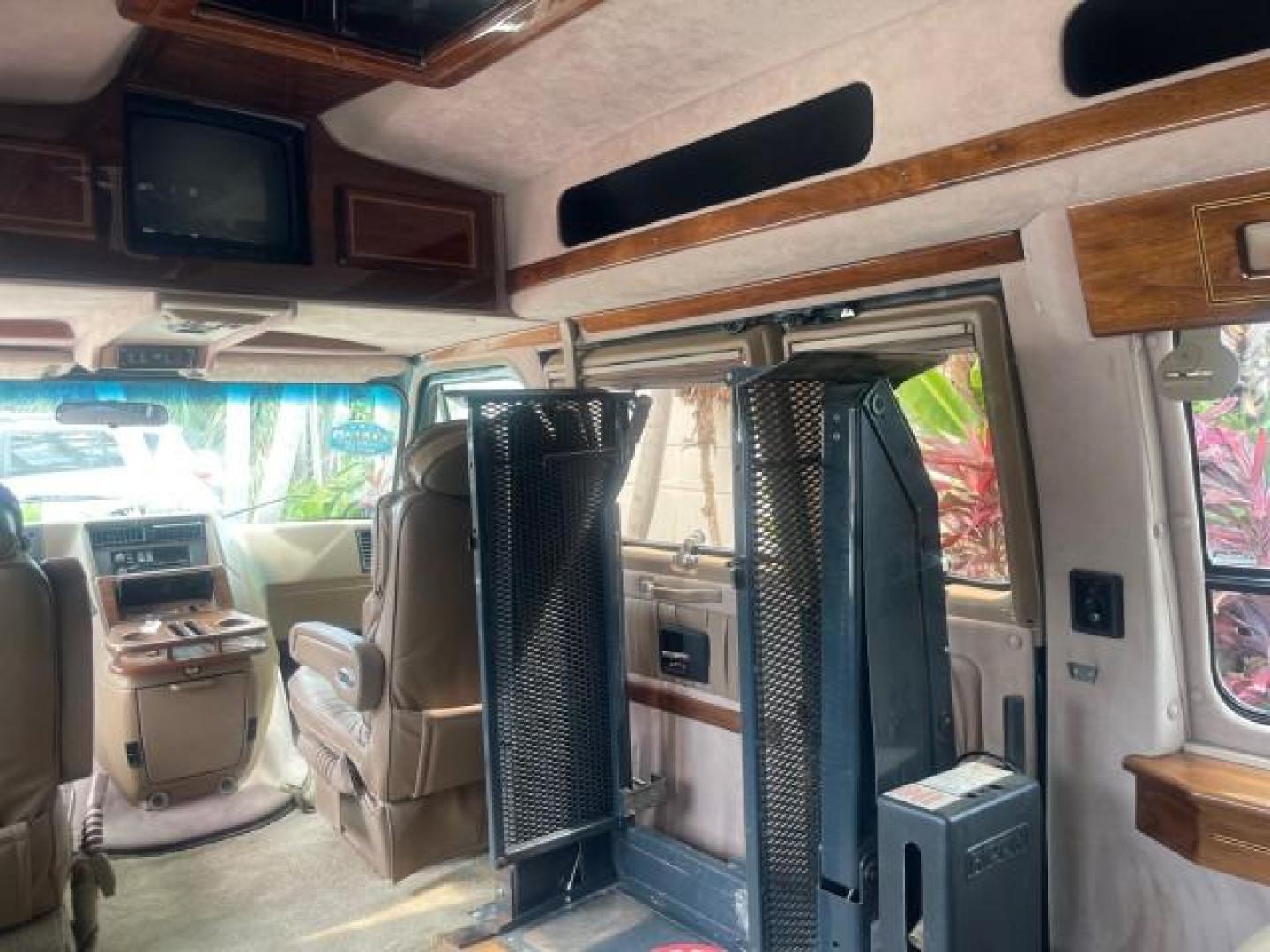 1995 GMC Vandura CONVERSION VAN LOW MILES 68,220 (1GDEG25K5SF) with an 5.7L EFI V8 Engine engine, Automatic transmission, located at 4701 North Dixie Hwy, Pompano Beach, FL, 33064, (954) 422-2889, 26.240938, -80.123474 - OUR WEBPAGE FLORIDACARS1.COM HAS OVER 100 PHOTOS AND FREE CARFAX LINK 1995 GMC RALLY/VANDURA G2500 VIN: 1GDEG25K5SF556971 1 G D E G 2 5 K 5 S F 5 5 6 9 7 1 VAN 5.7L V8 F - This is the best motor ever built. GASOLINE REAR WHEEL DRIVE Features ABS Brakes Air Conditioning Alloy Wheels AM/FM Stereo Auto - Photo#80
