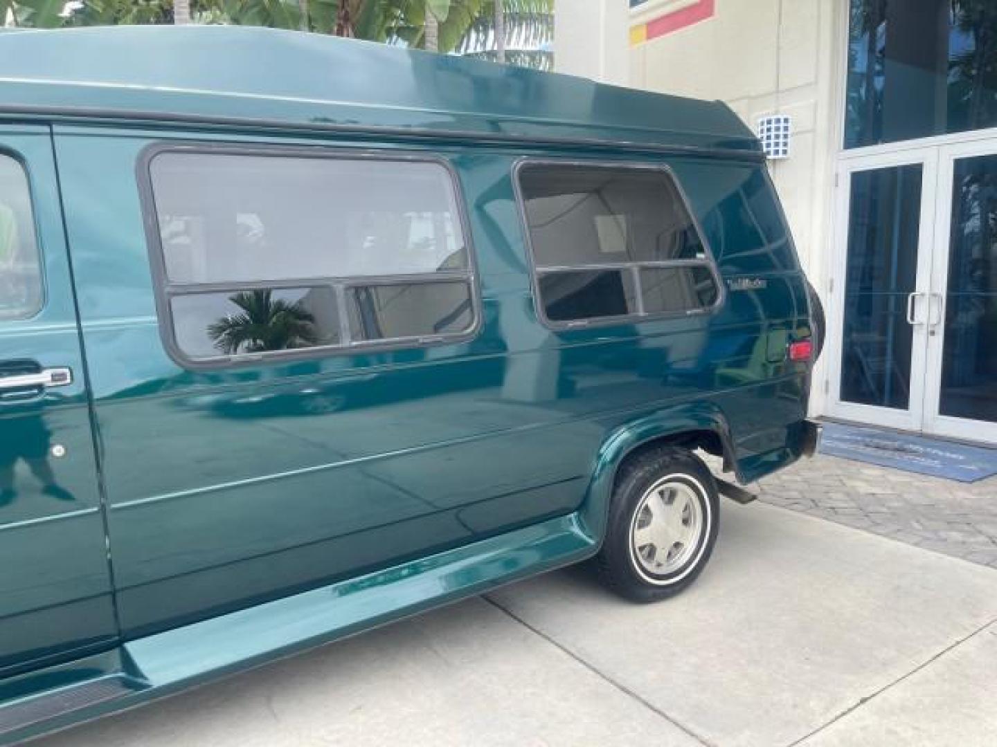 1995 GMC Vandura CONVERSION VAN LOW MILES 68,220 (1GDEG25K5SF) with an 5.7L EFI V8 Engine engine, Automatic transmission, located at 4701 North Dixie Hwy, Pompano Beach, FL, 33064, (954) 422-2889, 26.240938, -80.123474 - OUR WEBPAGE FLORIDACARS1.COM HAS OVER 100 PHOTOS AND FREE CARFAX LINK 1995 GMC RALLY/VANDURA G2500 VIN: 1GDEG25K5SF556971 1 G D E G 2 5 K 5 S F 5 5 6 9 7 1 VAN 5.7L V8 F - This is the best motor ever built. GASOLINE REAR WHEEL DRIVE Features ABS Brakes Air Conditioning Alloy Wheels AM/FM Stereo Auto - Photo#83