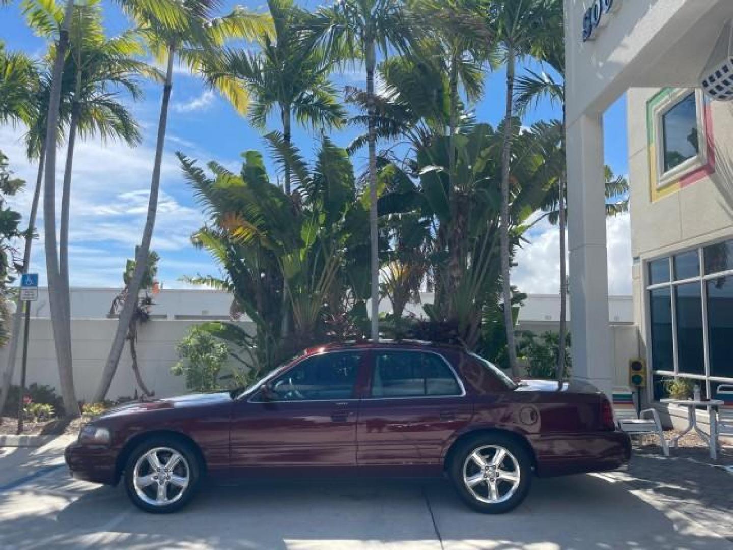 2004 Dark Toreador Red Metallic /Light Flint Mercury Marauder COBRA V 8 DUAL OVER HEAD CAM LOW MILES 21,997 (2MEHM79V94X) with an 4.6L DOHC SEFI 32-Valve V8 All-Aluminum Engine engine, Automatic transmission, located at 4701 North Dixie Hwy, Pompano Beach, FL, 33064, (954) 422-2889, 26.240938, -80.123474 - OUR WEBPAGE FLORIDACARS1.COM HAS OVER 100 PHOTOS AND FREE CARFAX LINK 2004 MERCURY MARAUDER VIN: 2MEHM79V94X671770 2 M E H M 7 9 V 9 4 X 6 7 1 7 7 0 SEDAN 4 DR 4.6L V8 F DOHC GASOLINE REAR WHEEL DRIVE Features ABS Brakes Air Conditioning Alloy Wheels AM/FM Stereo Audiophile Sound System Automatic Tr - Photo#4