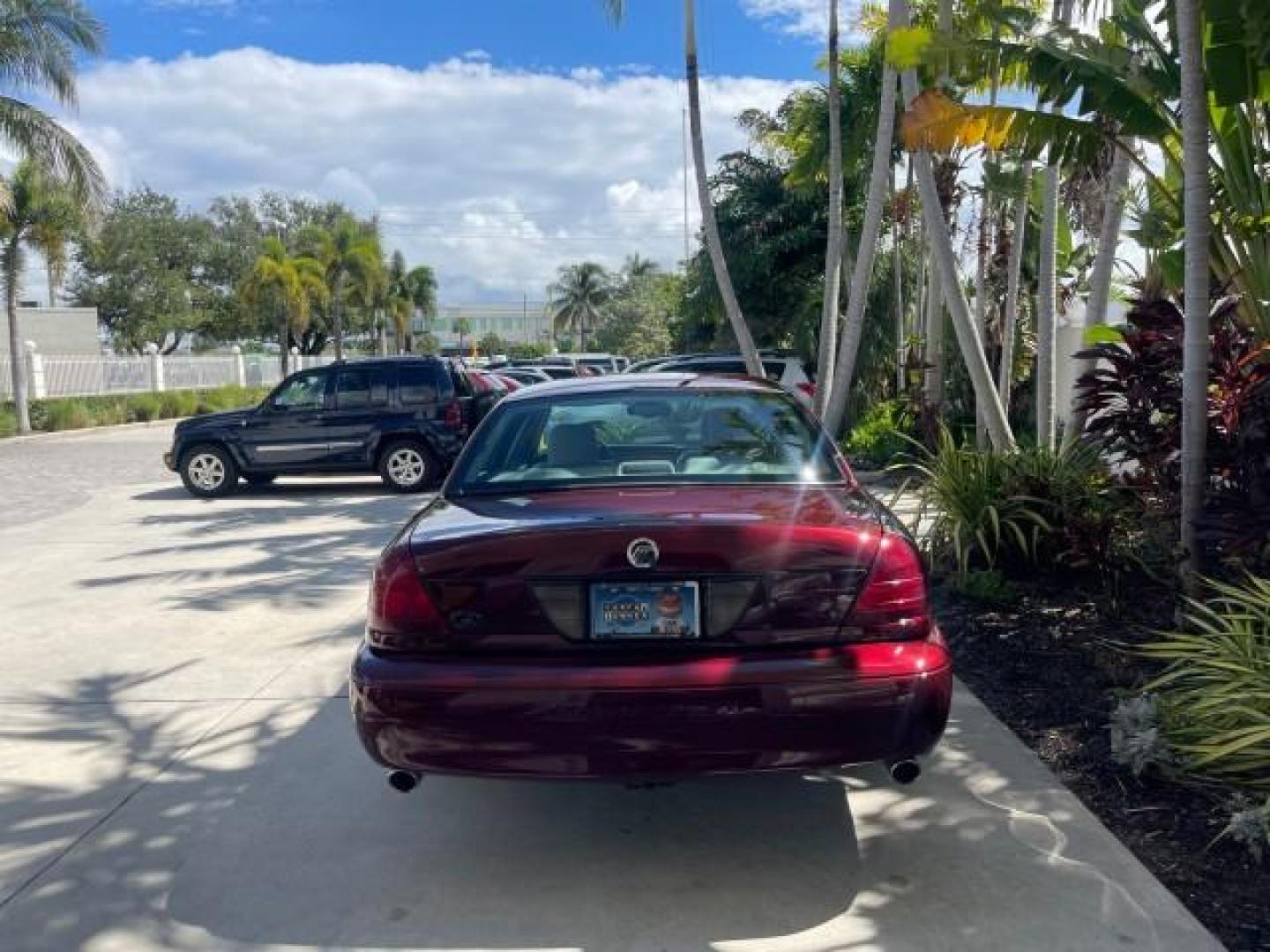 2004 Dark Toreador Red Metallic /Light Flint Mercury Marauder COBRA V 8 DUAL OVER HEAD CAM LOW MILES 21,997 (2MEHM79V94X) with an 4.6L DOHC SEFI 32-Valve V8 All-Aluminum Engine engine, Automatic transmission, located at 4701 North Dixie Hwy, Pompano Beach, FL, 33064, (954) 422-2889, 26.240938, -80.123474 - OUR WEBPAGE FLORIDACARS1.COM HAS OVER 100 PHOTOS AND FREE CARFAX LINK 2004 MERCURY MARAUDER VIN: 2MEHM79V94X671770 2 M E H M 7 9 V 9 4 X 6 7 1 7 7 0 SEDAN 4 DR 4.6L V8 F DOHC GASOLINE REAR WHEEL DRIVE Features ABS Brakes Air Conditioning Alloy Wheels AM/FM Stereo Audiophile Sound System Automatic Tr - Photo#6