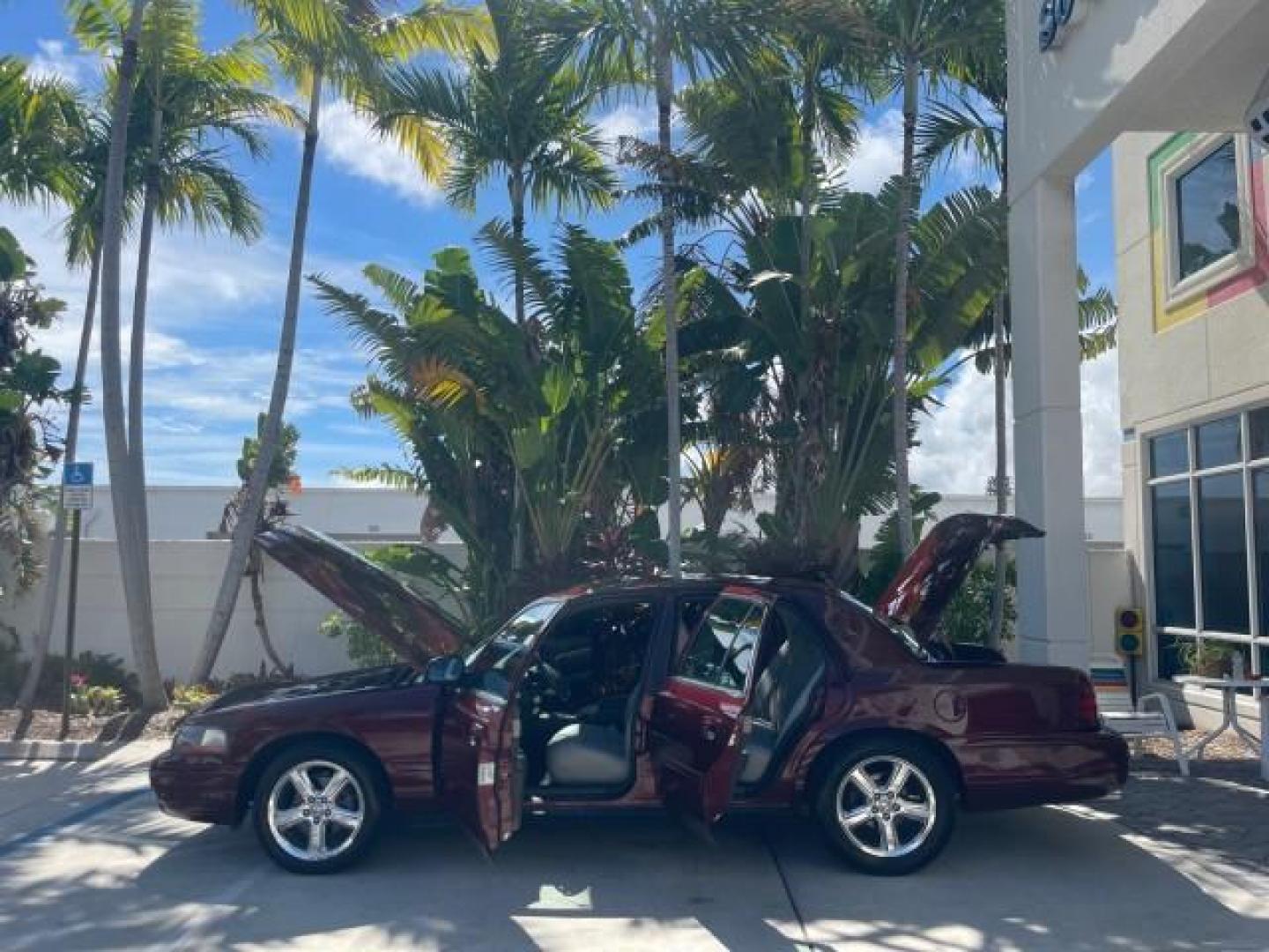 2004 Dark Toreador Red Metallic /Light Flint Mercury Marauder COBRA V 8 DUAL OVER HEAD CAM LOW MILES 21,997 (2MEHM79V94X) with an 4.6L DOHC SEFI 32-Valve V8 All-Aluminum Engine engine, Automatic transmission, located at 4701 North Dixie Hwy, Pompano Beach, FL, 33064, (954) 422-2889, 26.240938, -80.123474 - OUR WEBPAGE FLORIDACARS1.COM HAS OVER 100 PHOTOS AND FREE CARFAX LINK 2004 MERCURY MARAUDER VIN: 2MEHM79V94X671770 2 M E H M 7 9 V 9 4 X 6 7 1 7 7 0 SEDAN 4 DR 4.6L V8 F DOHC GASOLINE REAR WHEEL DRIVE Features ABS Brakes Air Conditioning Alloy Wheels AM/FM Stereo Audiophile Sound System Automatic Tr - Photo#8
