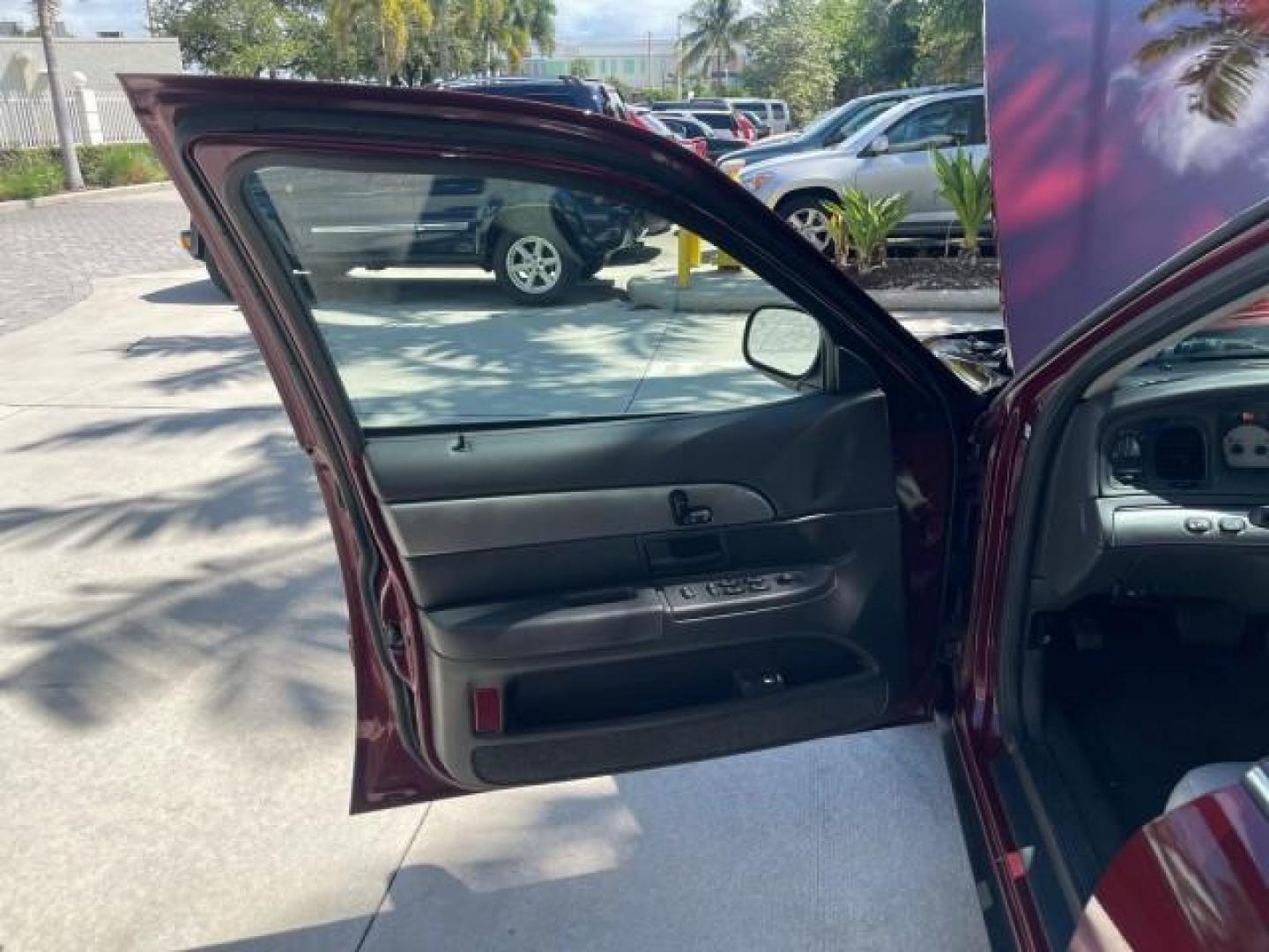 2004 Dark Toreador Red Metallic /Light Flint Mercury Marauder COBRA V 8 DUAL OVER HEAD CAM LOW MILES 21,997 (2MEHM79V94X) with an 4.6L DOHC SEFI 32-Valve V8 All-Aluminum Engine engine, Automatic transmission, located at 4701 North Dixie Hwy, Pompano Beach, FL, 33064, (954) 422-2889, 26.240938, -80.123474 - OUR WEBPAGE FLORIDACARS1.COM HAS OVER 100 PHOTOS AND FREE CARFAX LINK 2004 MERCURY MARAUDER VIN: 2MEHM79V94X671770 2 M E H M 7 9 V 9 4 X 6 7 1 7 7 0 SEDAN 4 DR 4.6L V8 F DOHC GASOLINE REAR WHEEL DRIVE Features ABS Brakes Air Conditioning Alloy Wheels AM/FM Stereo Audiophile Sound System Automatic Tr - Photo#9