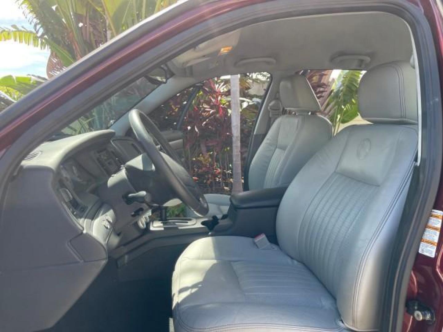 2004 Dark Toreador Red Metallic /Light Flint Mercury Marauder COBRA V 8 DUAL OVER HEAD CAM LOW MILES 21,997 (2MEHM79V94X) with an 4.6L DOHC SEFI 32-Valve V8 All-Aluminum Engine engine, Automatic transmission, located at 4701 North Dixie Hwy, Pompano Beach, FL, 33064, (954) 422-2889, 26.240938, -80.123474 - OUR WEBPAGE FLORIDACARS1.COM HAS OVER 100 PHOTOS AND FREE CARFAX LINK 2004 MERCURY MARAUDER VIN: 2MEHM79V94X671770 2 M E H M 7 9 V 9 4 X 6 7 1 7 7 0 SEDAN 4 DR 4.6L V8 F DOHC GASOLINE REAR WHEEL DRIVE Features ABS Brakes Air Conditioning Alloy Wheels AM/FM Stereo Audiophile Sound System Automatic Tr - Photo#10