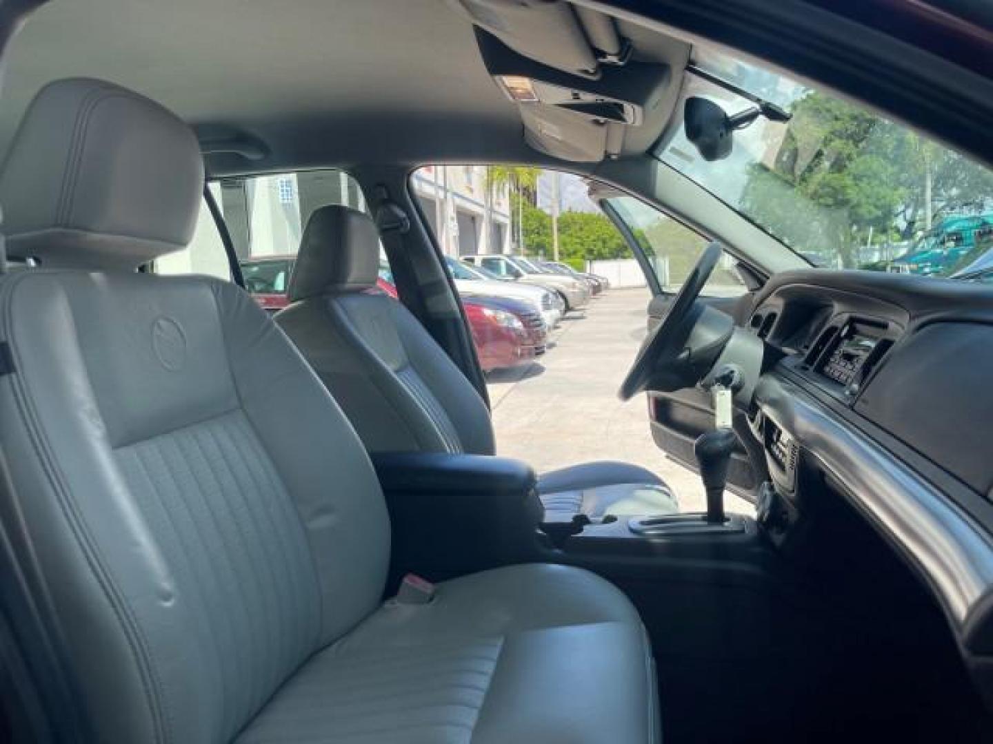 2004 Dark Toreador Red Metallic /Light Flint Mercury Marauder COBRA V 8 DUAL OVER HEAD CAM LOW MILES 21,997 (2MEHM79V94X) with an 4.6L DOHC SEFI 32-Valve V8 All-Aluminum Engine engine, Automatic transmission, located at 4701 North Dixie Hwy, Pompano Beach, FL, 33064, (954) 422-2889, 26.240938, -80.123474 - OUR WEBPAGE FLORIDACARS1.COM HAS OVER 100 PHOTOS AND FREE CARFAX LINK 2004 MERCURY MARAUDER VIN: 2MEHM79V94X671770 2 M E H M 7 9 V 9 4 X 6 7 1 7 7 0 SEDAN 4 DR 4.6L V8 F DOHC GASOLINE REAR WHEEL DRIVE Features ABS Brakes Air Conditioning Alloy Wheels AM/FM Stereo Audiophile Sound System Automatic Tr - Photo#12