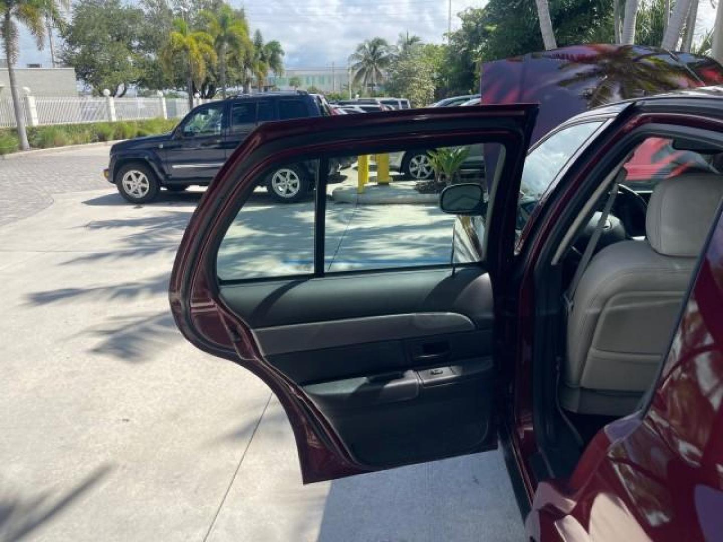 2004 Dark Toreador Red Metallic /Light Flint Mercury Marauder COBRA V 8 DUAL OVER HEAD CAM LOW MILES 21,997 (2MEHM79V94X) with an 4.6L DOHC SEFI 32-Valve V8 All-Aluminum Engine engine, Automatic transmission, located at 4701 North Dixie Hwy, Pompano Beach, FL, 33064, (954) 422-2889, 26.240938, -80.123474 - OUR WEBPAGE FLORIDACARS1.COM HAS OVER 100 PHOTOS AND FREE CARFAX LINK 2004 MERCURY MARAUDER VIN: 2MEHM79V94X671770 2 M E H M 7 9 V 9 4 X 6 7 1 7 7 0 SEDAN 4 DR 4.6L V8 F DOHC GASOLINE REAR WHEEL DRIVE Features ABS Brakes Air Conditioning Alloy Wheels AM/FM Stereo Audiophile Sound System Automatic Tr - Photo#13