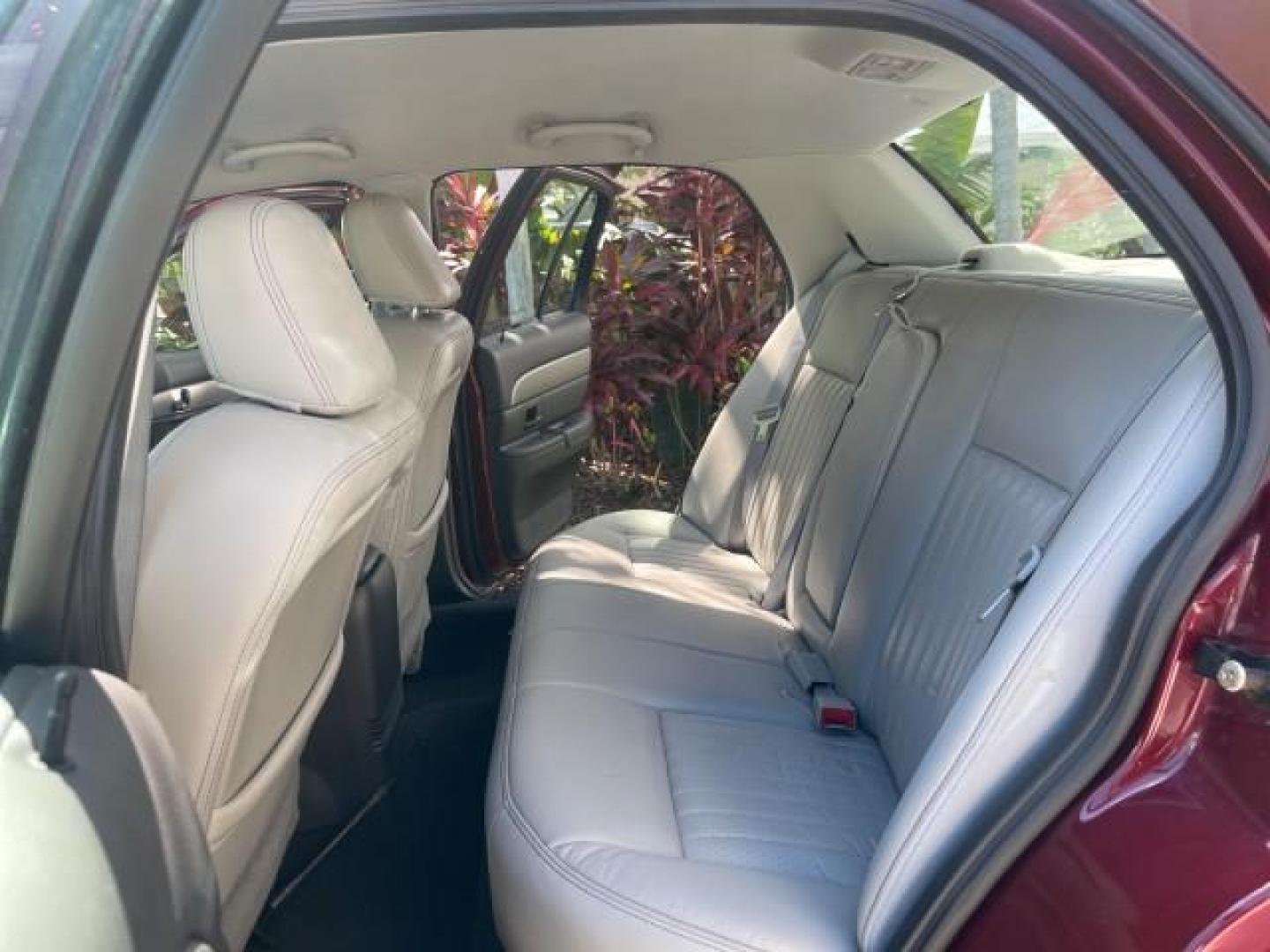 2004 Dark Toreador Red Metallic /Light Flint Mercury Marauder COBRA V 8 DUAL OVER HEAD CAM LOW MILES 21,997 (2MEHM79V94X) with an 4.6L DOHC SEFI 32-Valve V8 All-Aluminum Engine engine, Automatic transmission, located at 4701 North Dixie Hwy, Pompano Beach, FL, 33064, (954) 422-2889, 26.240938, -80.123474 - OUR WEBPAGE FLORIDACARS1.COM HAS OVER 100 PHOTOS AND FREE CARFAX LINK 2004 MERCURY MARAUDER VIN: 2MEHM79V94X671770 2 M E H M 7 9 V 9 4 X 6 7 1 7 7 0 SEDAN 4 DR 4.6L V8 F DOHC GASOLINE REAR WHEEL DRIVE Features ABS Brakes Air Conditioning Alloy Wheels AM/FM Stereo Audiophile Sound System Automatic Tr - Photo#14