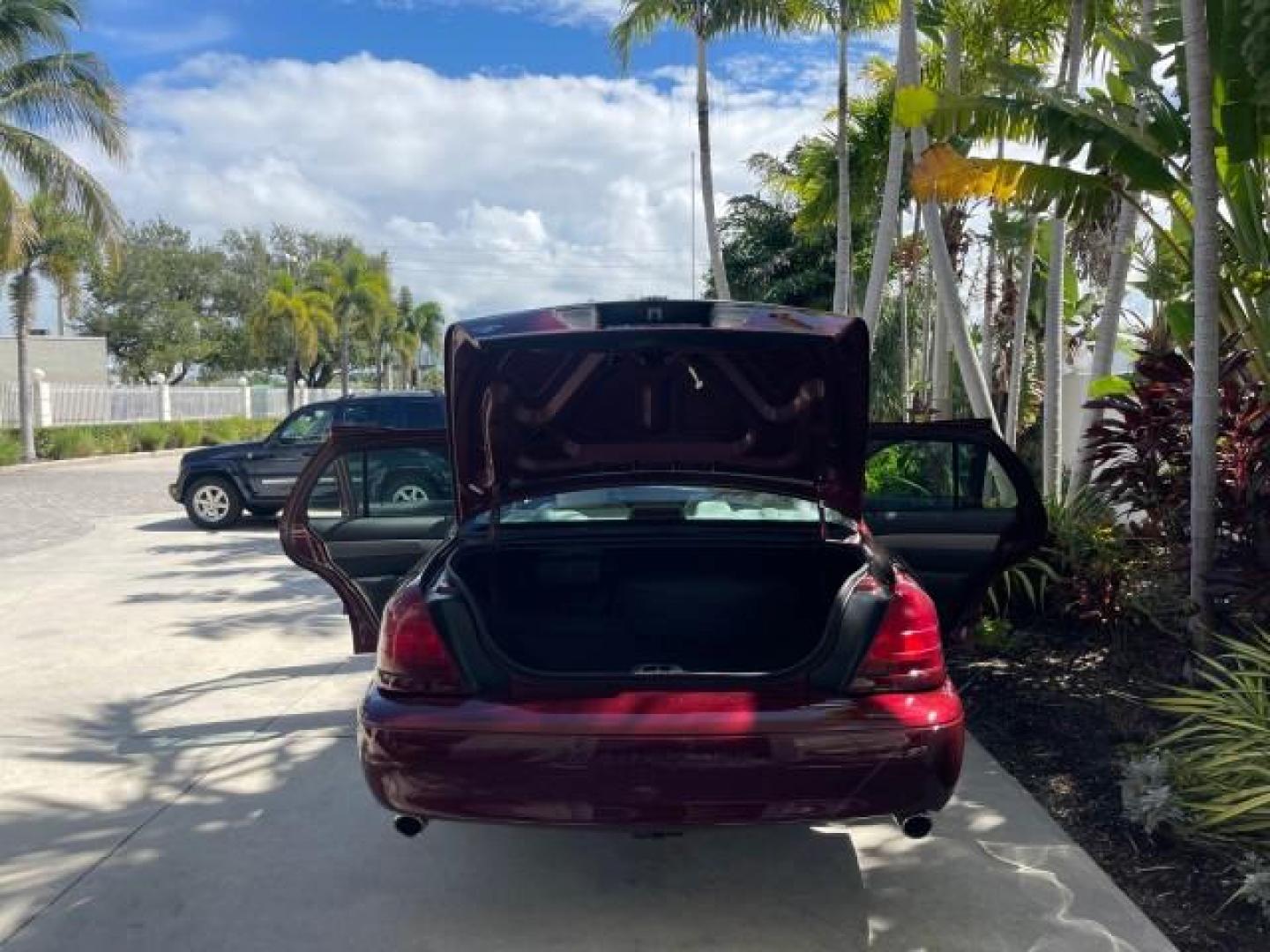 2004 Dark Toreador Red Metallic /Light Flint Mercury Marauder COBRA V 8 DUAL OVER HEAD CAM LOW MILES 21,997 (2MEHM79V94X) with an 4.6L DOHC SEFI 32-Valve V8 All-Aluminum Engine engine, Automatic transmission, located at 4701 North Dixie Hwy, Pompano Beach, FL, 33064, (954) 422-2889, 26.240938, -80.123474 - OUR WEBPAGE FLORIDACARS1.COM HAS OVER 100 PHOTOS AND FREE CARFAX LINK 2004 MERCURY MARAUDER VIN: 2MEHM79V94X671770 2 M E H M 7 9 V 9 4 X 6 7 1 7 7 0 SEDAN 4 DR 4.6L V8 F DOHC GASOLINE REAR WHEEL DRIVE Features ABS Brakes Air Conditioning Alloy Wheels AM/FM Stereo Audiophile Sound System Automatic Tr - Photo#15