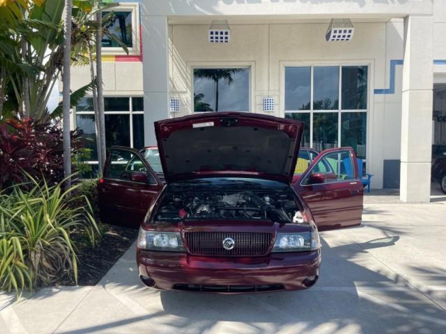 2004 Dark Toreador Red Metallic /Light Flint Mercury Marauder COBRA V 8 DUAL OVER HEAD CAM LOW MILES 21,997 (2MEHM79V94X) with an 4.6L DOHC SEFI 32-Valve V8 All-Aluminum Engine engine, Automatic transmission, located at 4701 North Dixie Hwy, Pompano Beach, FL, 33064, (954) 422-2889, 26.240938, -80.123474 - OUR WEBPAGE FLORIDACARS1.COM HAS OVER 100 PHOTOS AND FREE CARFAX LINK 2004 MERCURY MARAUDER VIN: 2MEHM79V94X671770 2 M E H M 7 9 V 9 4 X 6 7 1 7 7 0 SEDAN 4 DR 4.6L V8 F DOHC GASOLINE REAR WHEEL DRIVE Features ABS Brakes Air Conditioning Alloy Wheels AM/FM Stereo Audiophile Sound System Automatic Tr - Photo#16
