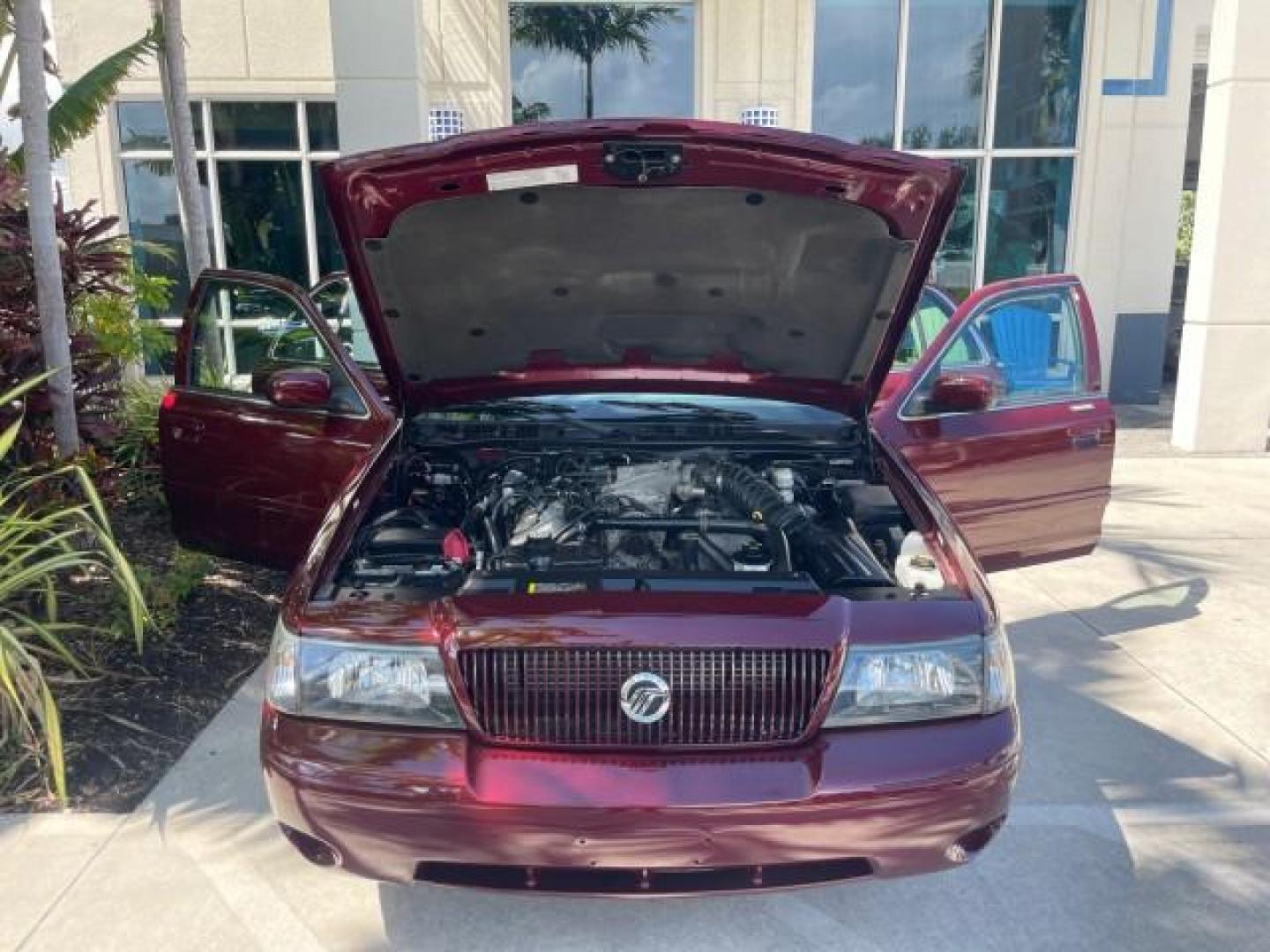 2004 Dark Toreador Red Metallic /Light Flint Mercury Marauder COBRA V 8 DUAL OVER HEAD CAM LOW MILES 21,997 (2MEHM79V94X) with an 4.6L DOHC SEFI 32-Valve V8 All-Aluminum Engine engine, Automatic transmission, located at 4701 North Dixie Hwy, Pompano Beach, FL, 33064, (954) 422-2889, 26.240938, -80.123474 - OUR WEBPAGE FLORIDACARS1.COM HAS OVER 100 PHOTOS AND FREE CARFAX LINK 2004 MERCURY MARAUDER VIN: 2MEHM79V94X671770 2 M E H M 7 9 V 9 4 X 6 7 1 7 7 0 SEDAN 4 DR 4.6L V8 F DOHC GASOLINE REAR WHEEL DRIVE Features ABS Brakes Air Conditioning Alloy Wheels AM/FM Stereo Audiophile Sound System Automatic Tr - Photo#17