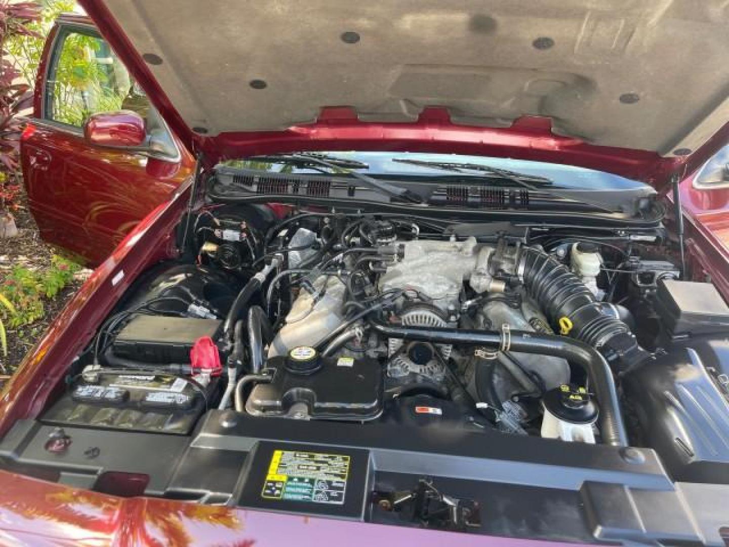 2004 Dark Toreador Red Metallic /Light Flint Mercury Marauder COBRA V 8 DUAL OVER HEAD CAM LOW MILES 21,997 (2MEHM79V94X) with an 4.6L DOHC SEFI 32-Valve V8 All-Aluminum Engine engine, Automatic transmission, located at 4701 North Dixie Hwy, Pompano Beach, FL, 33064, (954) 422-2889, 26.240938, -80.123474 - OUR WEBPAGE FLORIDACARS1.COM HAS OVER 100 PHOTOS AND FREE CARFAX LINK 2004 MERCURY MARAUDER VIN: 2MEHM79V94X671770 2 M E H M 7 9 V 9 4 X 6 7 1 7 7 0 SEDAN 4 DR 4.6L V8 F DOHC GASOLINE REAR WHEEL DRIVE Features ABS Brakes Air Conditioning Alloy Wheels AM/FM Stereo Audiophile Sound System Automatic Tr - Photo#25