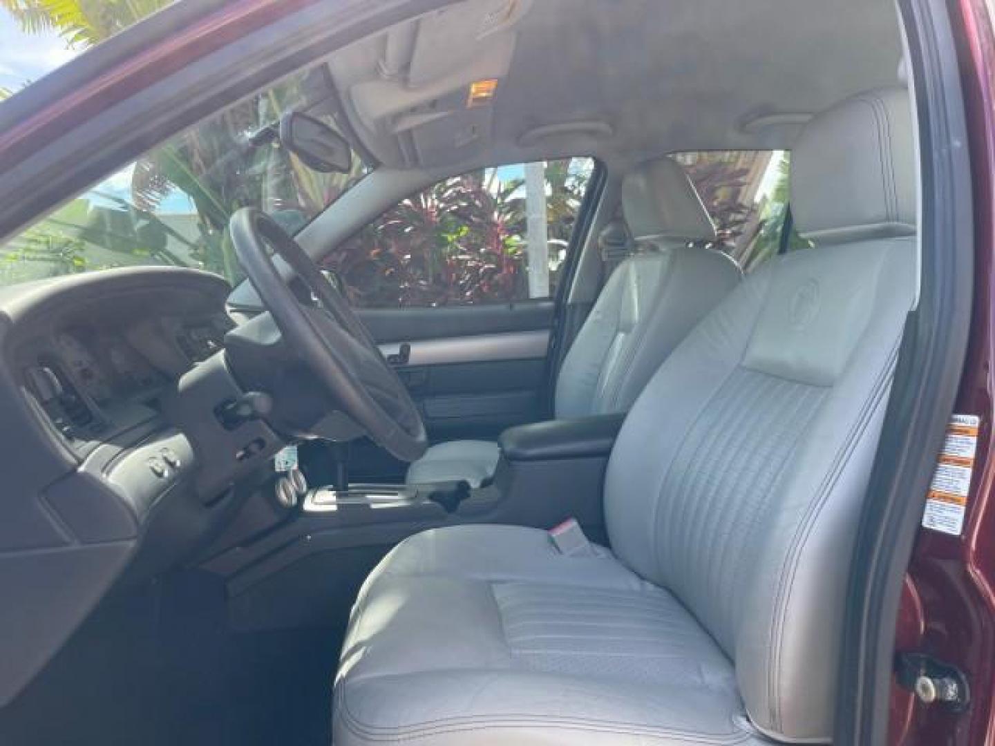 2004 Dark Toreador Red Metallic /Light Flint Mercury Marauder COBRA V 8 DUAL OVER HEAD CAM LOW MILES 21,997 (2MEHM79V94X) with an 4.6L DOHC SEFI 32-Valve V8 All-Aluminum Engine engine, Automatic transmission, located at 4701 North Dixie Hwy, Pompano Beach, FL, 33064, (954) 422-2889, 26.240938, -80.123474 - OUR WEBPAGE FLORIDACARS1.COM HAS OVER 100 PHOTOS AND FREE CARFAX LINK 2004 MERCURY MARAUDER VIN: 2MEHM79V94X671770 2 M E H M 7 9 V 9 4 X 6 7 1 7 7 0 SEDAN 4 DR 4.6L V8 F DOHC GASOLINE REAR WHEEL DRIVE Features ABS Brakes Air Conditioning Alloy Wheels AM/FM Stereo Audiophile Sound System Automatic Tr - Photo#43