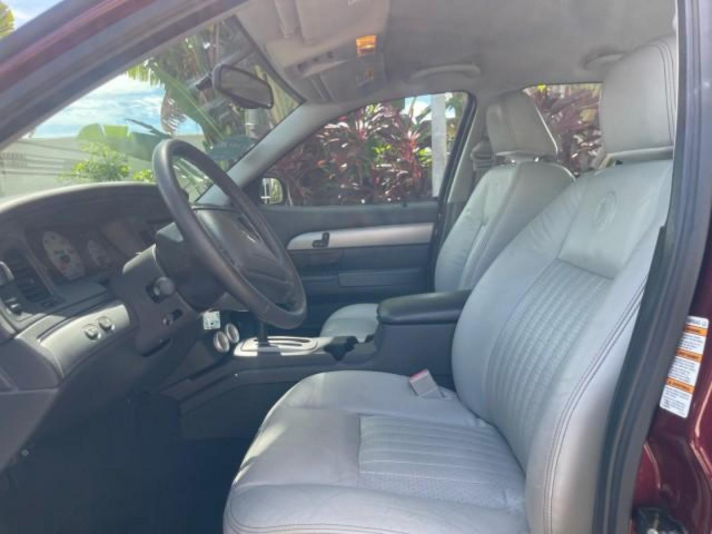 2004 Dark Toreador Red Metallic /Light Flint Mercury Marauder COBRA V 8 DUAL OVER HEAD CAM LOW MILES 21,997 (2MEHM79V94X) with an 4.6L DOHC SEFI 32-Valve V8 All-Aluminum Engine engine, Automatic transmission, located at 4701 North Dixie Hwy, Pompano Beach, FL, 33064, (954) 422-2889, 26.240938, -80.123474 - OUR WEBPAGE FLORIDACARS1.COM HAS OVER 100 PHOTOS AND FREE CARFAX LINK 2004 MERCURY MARAUDER VIN: 2MEHM79V94X671770 2 M E H M 7 9 V 9 4 X 6 7 1 7 7 0 SEDAN 4 DR 4.6L V8 F DOHC GASOLINE REAR WHEEL DRIVE Features ABS Brakes Air Conditioning Alloy Wheels AM/FM Stereo Audiophile Sound System Automatic Tr - Photo#44