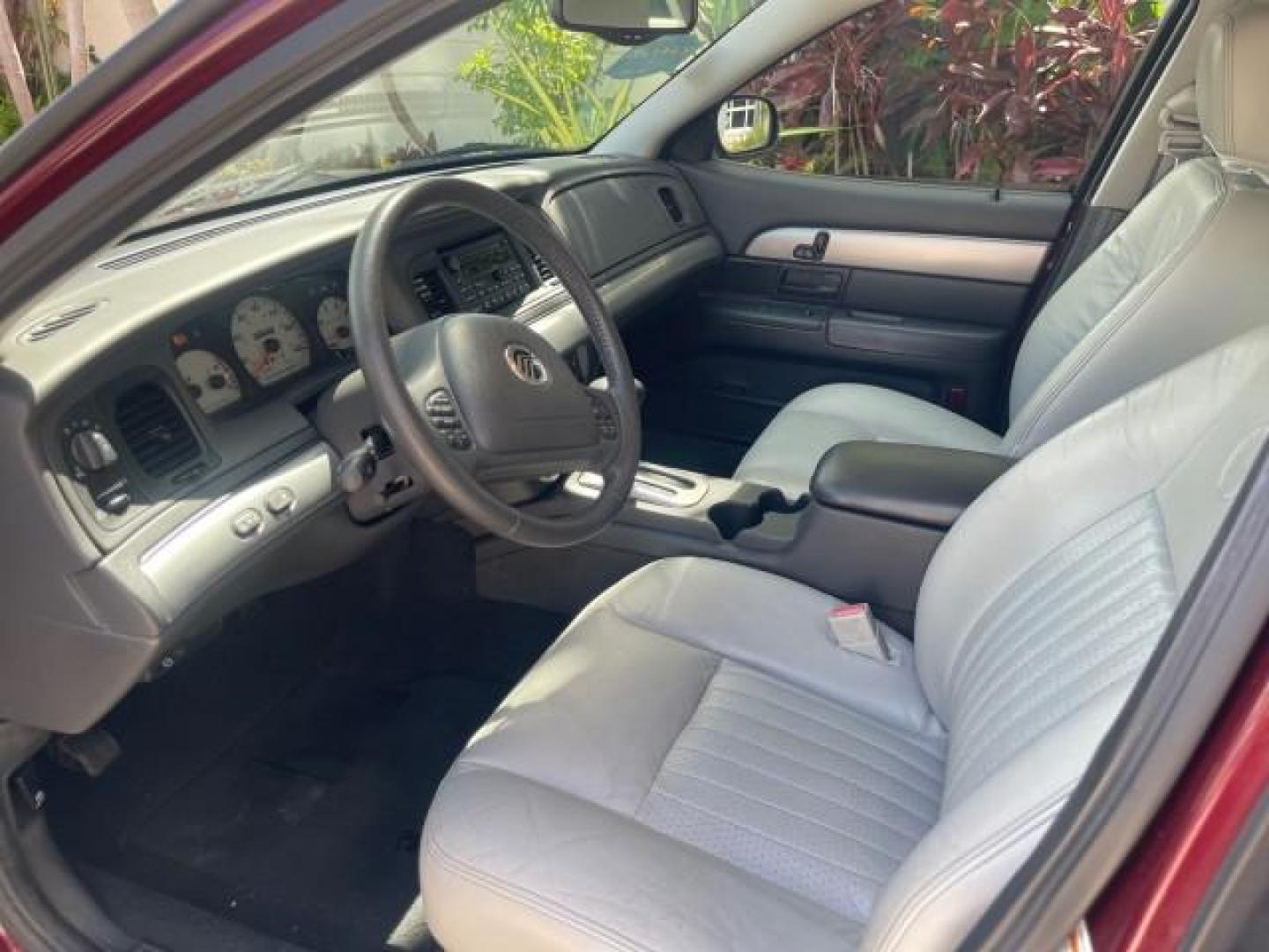 2004 Dark Toreador Red Metallic /Light Flint Mercury Marauder COBRA V 8 DUAL OVER HEAD CAM LOW MILES 21,997 (2MEHM79V94X) with an 4.6L DOHC SEFI 32-Valve V8 All-Aluminum Engine engine, Automatic transmission, located at 4701 North Dixie Hwy, Pompano Beach, FL, 33064, (954) 422-2889, 26.240938, -80.123474 - OUR WEBPAGE FLORIDACARS1.COM HAS OVER 100 PHOTOS AND FREE CARFAX LINK 2004 MERCURY MARAUDER VIN: 2MEHM79V94X671770 2 M E H M 7 9 V 9 4 X 6 7 1 7 7 0 SEDAN 4 DR 4.6L V8 F DOHC GASOLINE REAR WHEEL DRIVE Features ABS Brakes Air Conditioning Alloy Wheels AM/FM Stereo Audiophile Sound System Automatic Tr - Photo#45