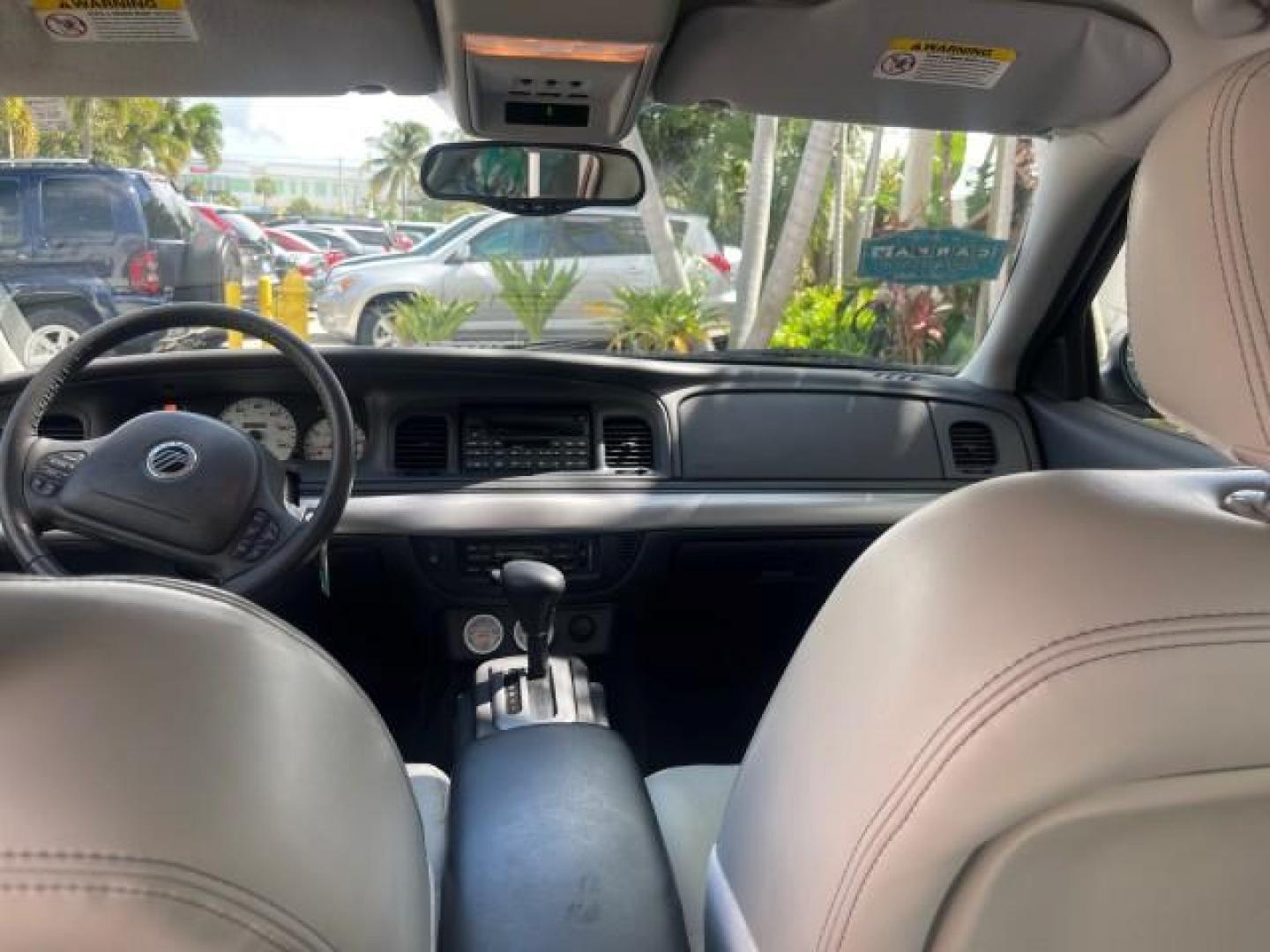 2004 Dark Toreador Red Metallic /Light Flint Mercury Marauder COBRA V 8 DUAL OVER HEAD CAM LOW MILES 21,997 (2MEHM79V94X) with an 4.6L DOHC SEFI 32-Valve V8 All-Aluminum Engine engine, Automatic transmission, located at 4701 North Dixie Hwy, Pompano Beach, FL, 33064, (954) 422-2889, 26.240938, -80.123474 - OUR WEBPAGE FLORIDACARS1.COM HAS OVER 100 PHOTOS AND FREE CARFAX LINK 2004 MERCURY MARAUDER VIN: 2MEHM79V94X671770 2 M E H M 7 9 V 9 4 X 6 7 1 7 7 0 SEDAN 4 DR 4.6L V8 F DOHC GASOLINE REAR WHEEL DRIVE Features ABS Brakes Air Conditioning Alloy Wheels AM/FM Stereo Audiophile Sound System Automatic Tr - Photo#76