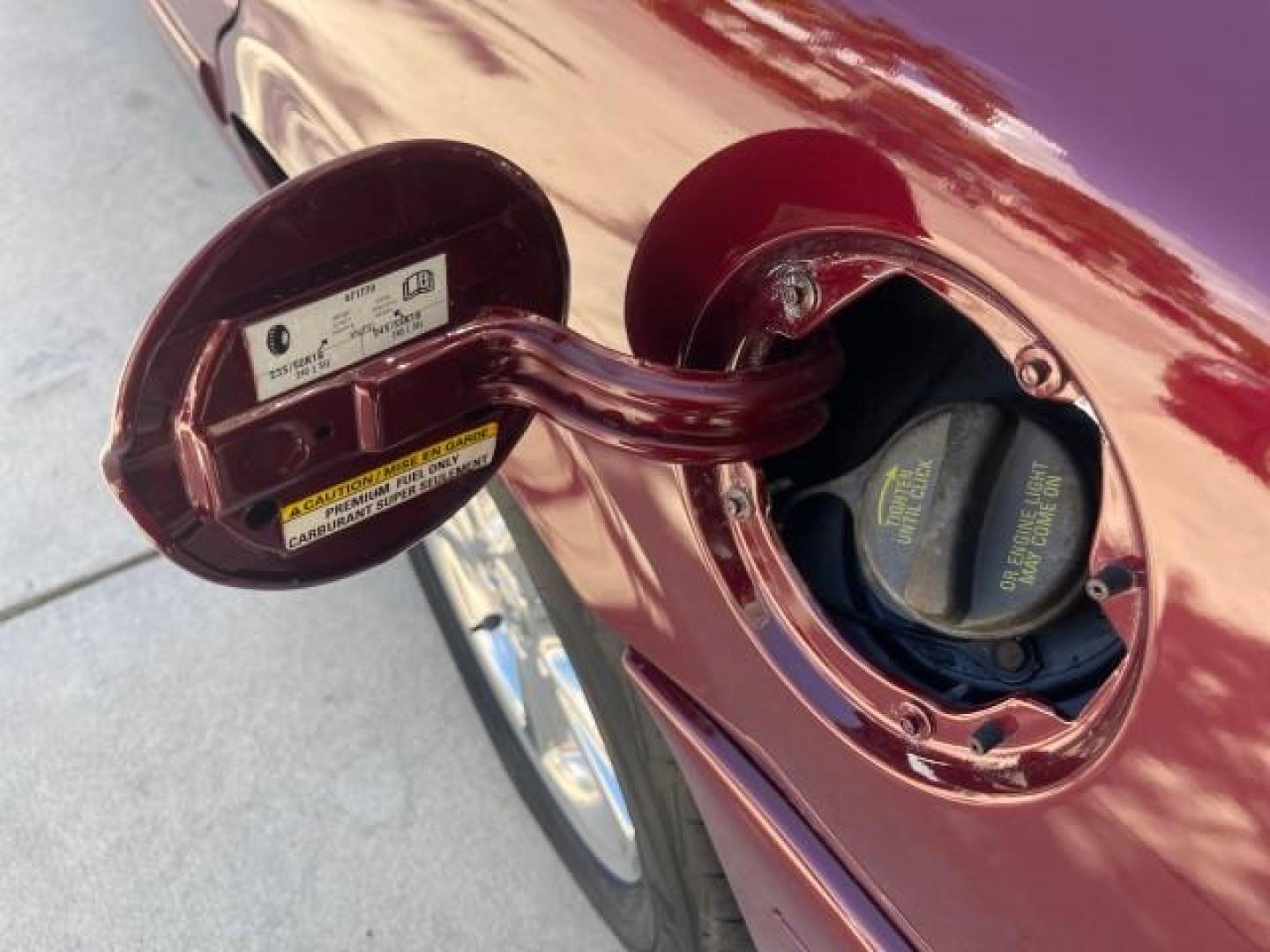2004 Dark Toreador Red Metallic /Light Flint Mercury Marauder COBRA V 8 DUAL OVER HEAD CAM LOW MILES 21,997 (2MEHM79V94X) with an 4.6L DOHC SEFI 32-Valve V8 All-Aluminum Engine engine, Automatic transmission, located at 4701 North Dixie Hwy, Pompano Beach, FL, 33064, (954) 422-2889, 26.240938, -80.123474 - OUR WEBPAGE FLORIDACARS1.COM HAS OVER 100 PHOTOS AND FREE CARFAX LINK 2004 MERCURY MARAUDER VIN: 2MEHM79V94X671770 2 M E H M 7 9 V 9 4 X 6 7 1 7 7 0 SEDAN 4 DR 4.6L V8 F DOHC GASOLINE REAR WHEEL DRIVE Features ABS Brakes Air Conditioning Alloy Wheels AM/FM Stereo Audiophile Sound System Automatic Tr - Photo#82